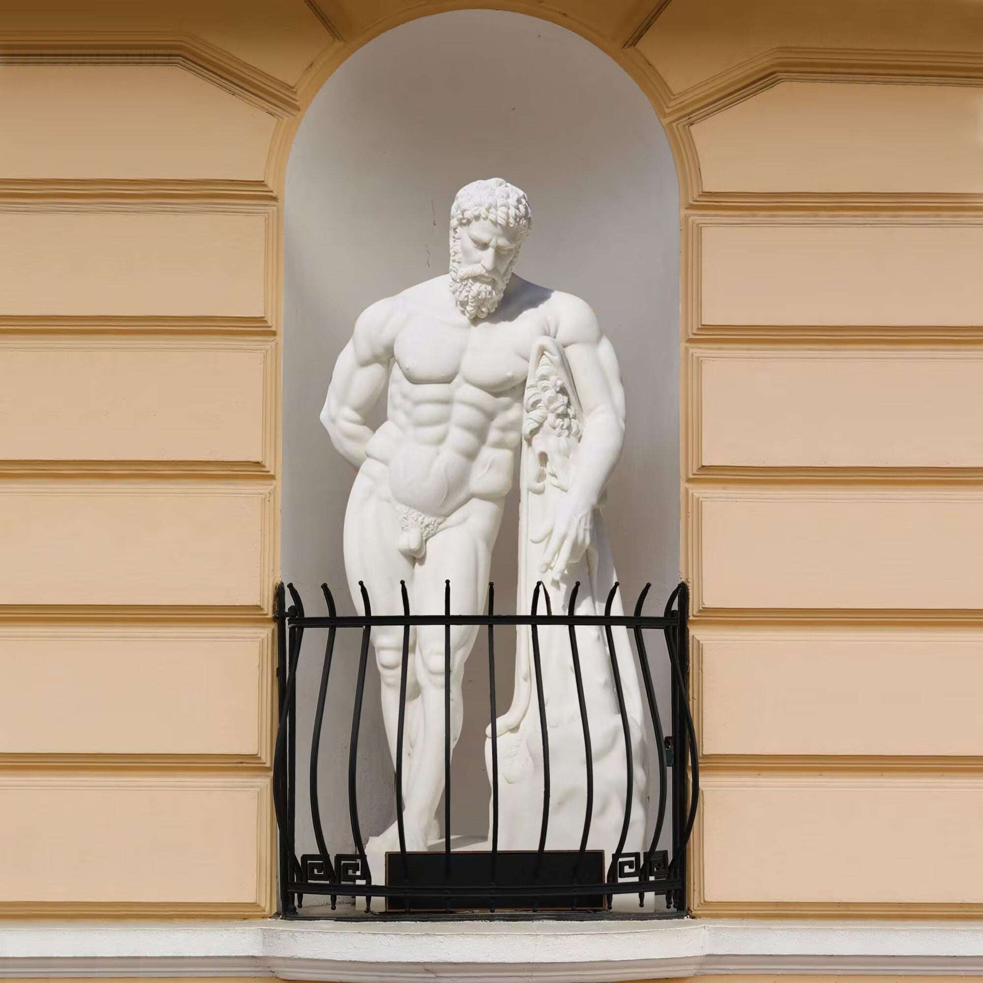 Farnese Hercules marble statue display in balconette