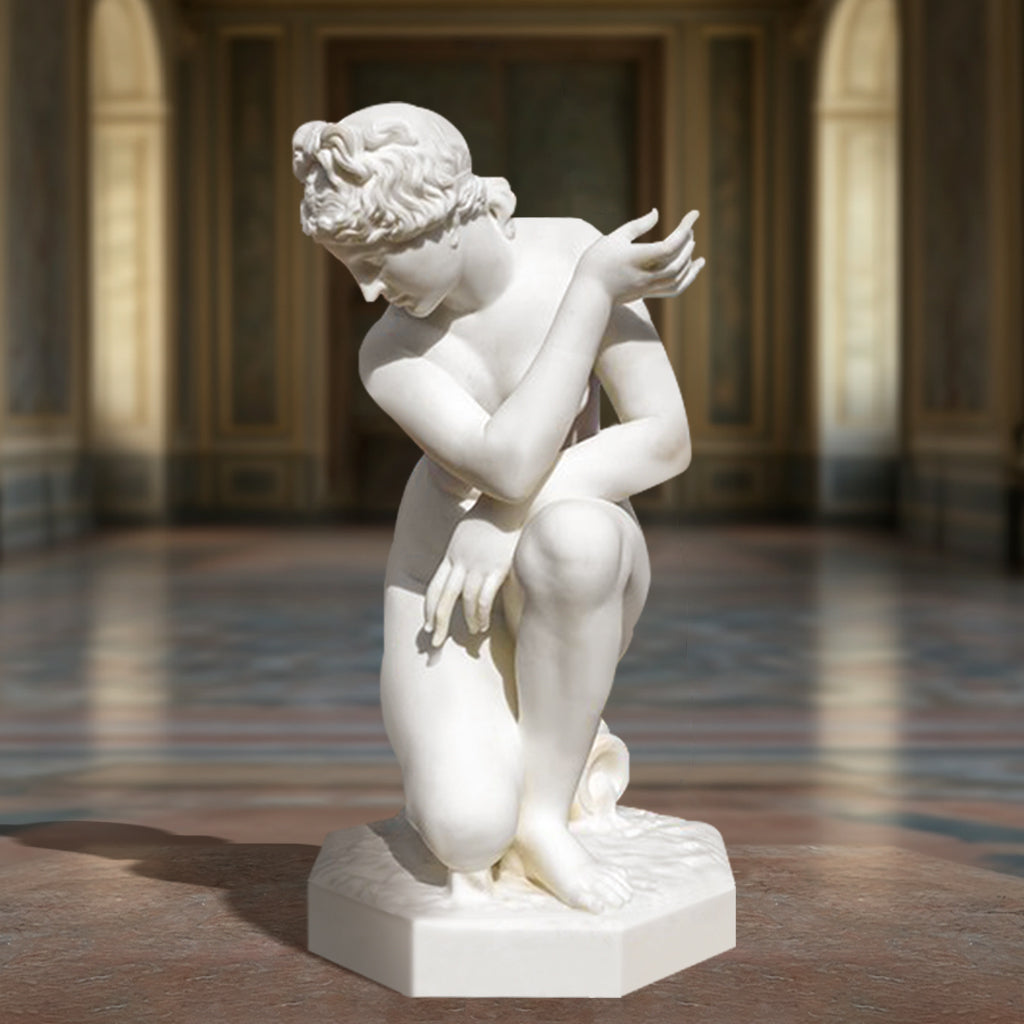 Marble Aphrodite Crouching Venus Statue, display in art gallery.