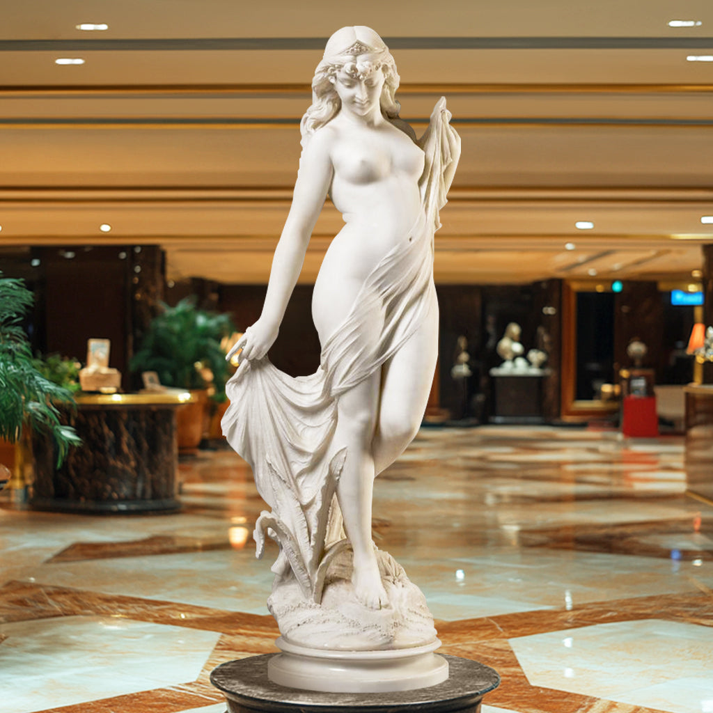 Elegant indoor white marble "The Bather" sculpture featuring a graceful lady with flowing drapery, display luxury interiors.