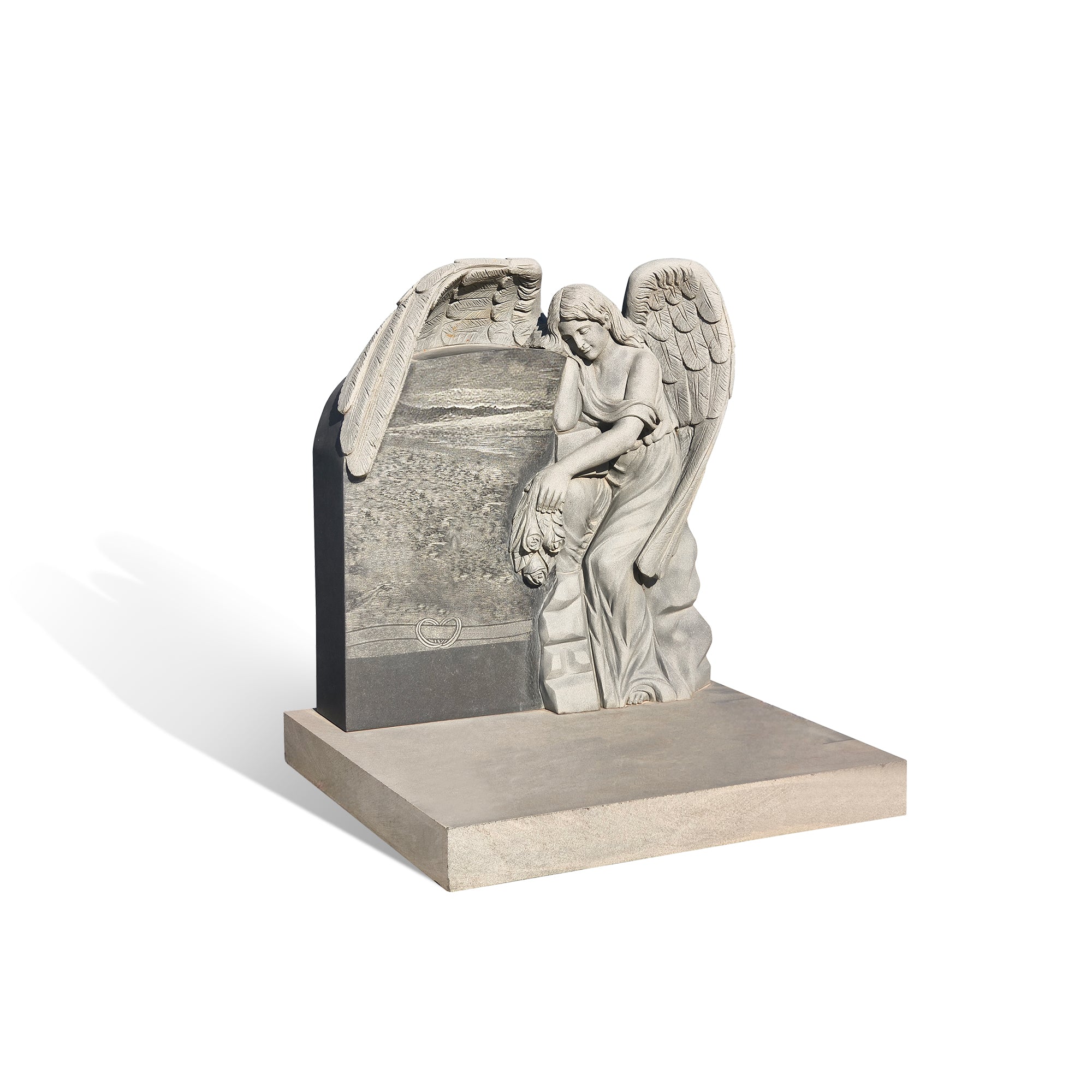 grey granite angel gravestone featuring large wings and detailed carving, designed for cemetery memorials and monuments of peace.