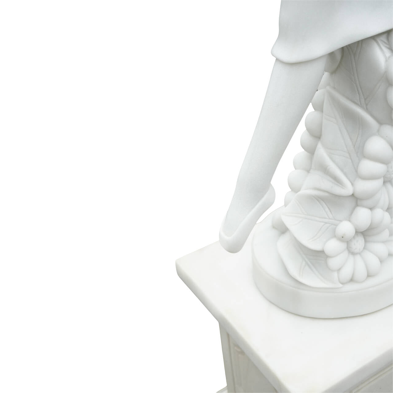 close up marble lady statue leg floral pedestal detail outdoor sculpture garden decoration luxury estate
