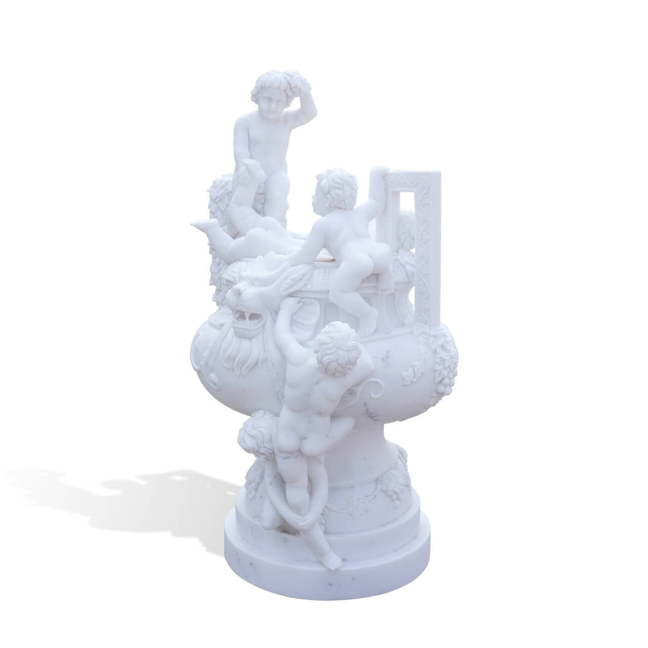 three-quarter angle of white marble cherub sculpture with putti figures and ornate lion head details, classical garden and courtyard décor.