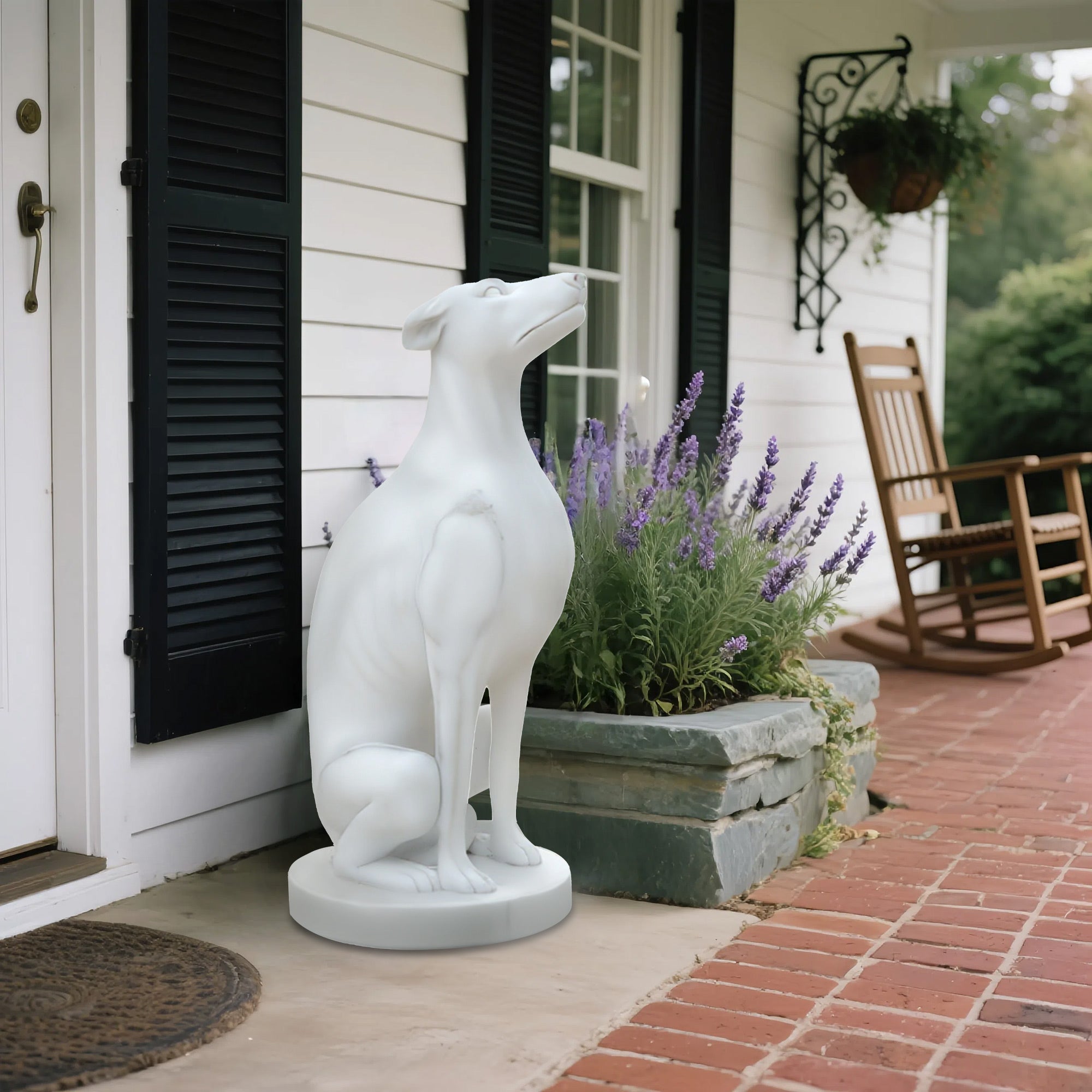 white marble dog statue used as porch and garden decor sitting gracefully beside lavender plants