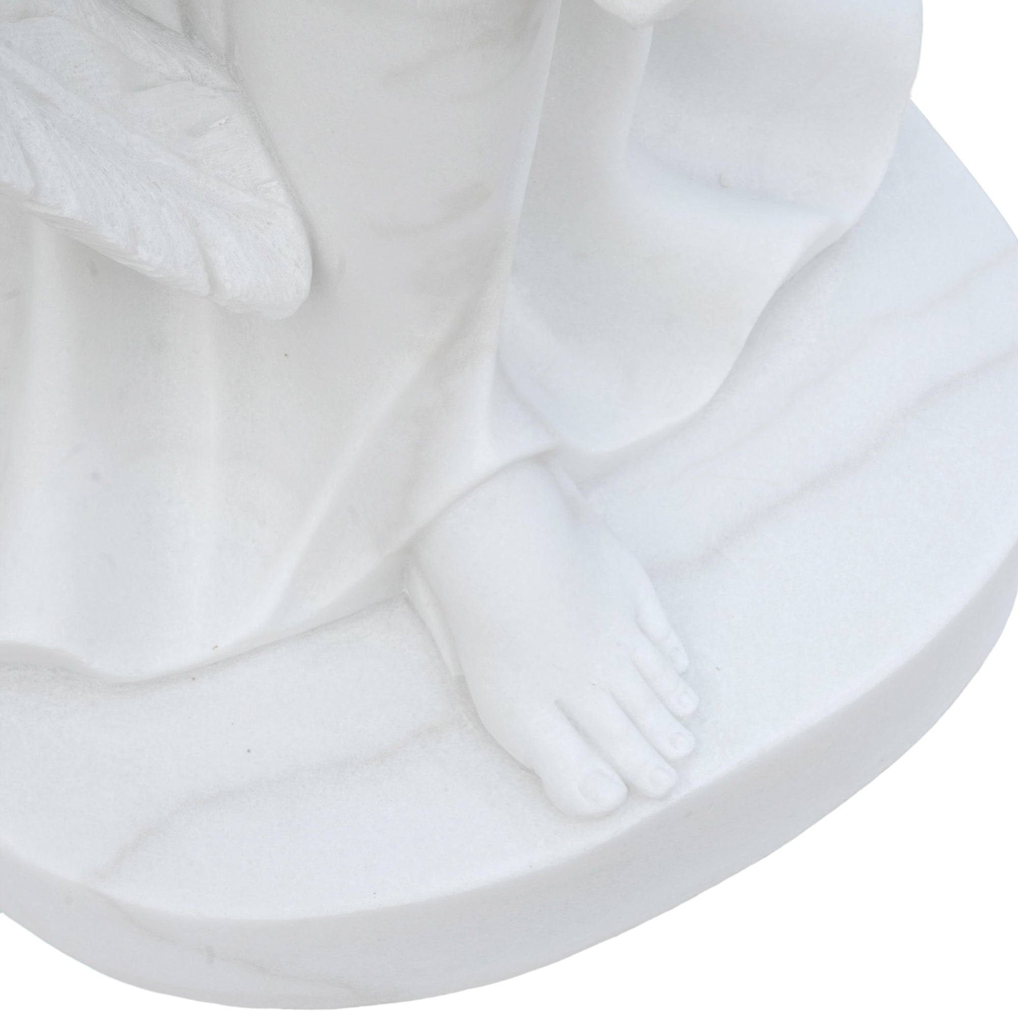 white marble angel memorial sculpture foot and base detail with lifelike carving