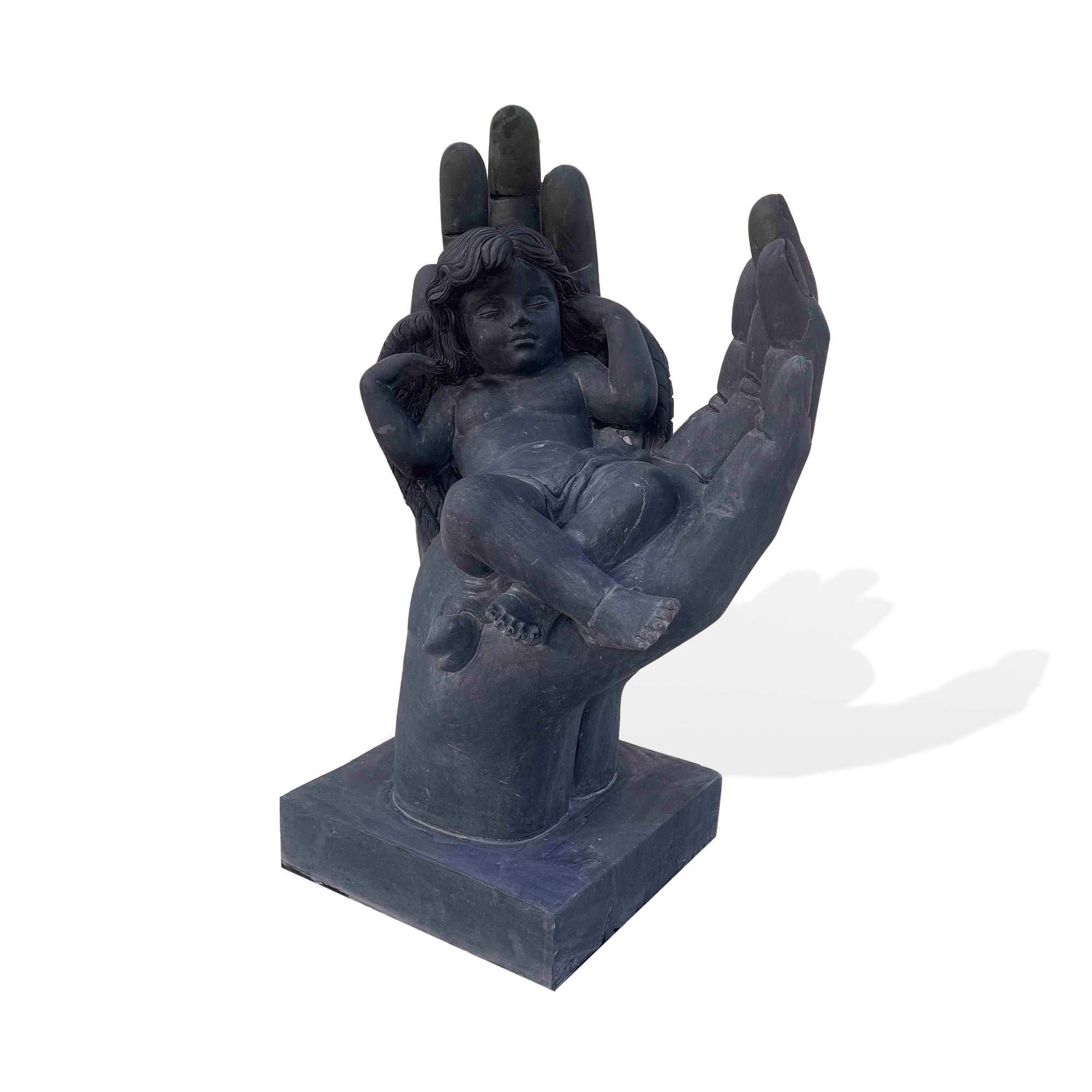 Cherub sculpture in black marble, dimensions 27.6W x 40H x 24.7D, featuring a peaceful cherub lying in a hand with detailed wings, ideal for elegant home décor or memorial spaces