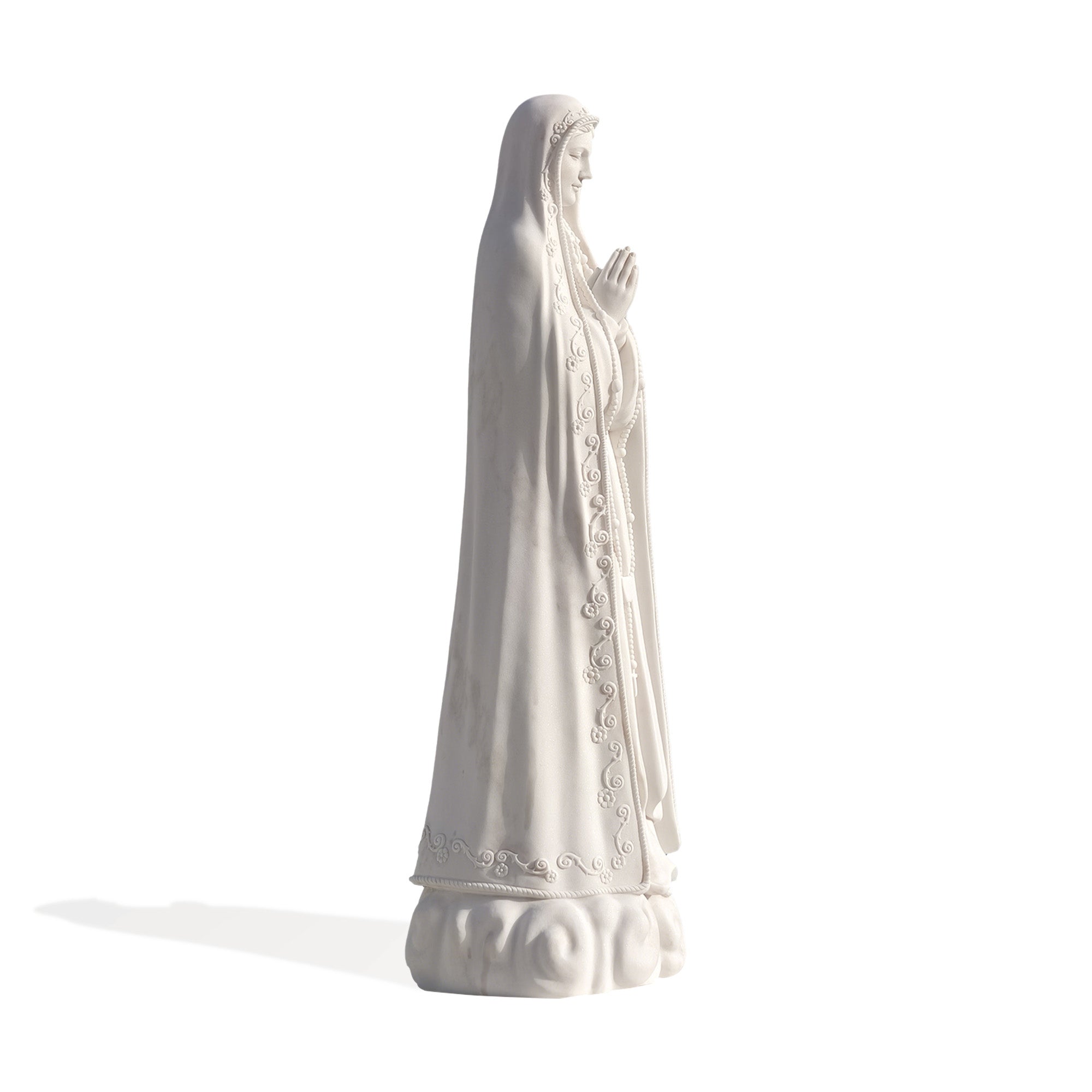 Side view of Our Lady of Fatima hand-carved marble statue showing fine robe details and prayer posture, ideal for chapel or sanctuary display.