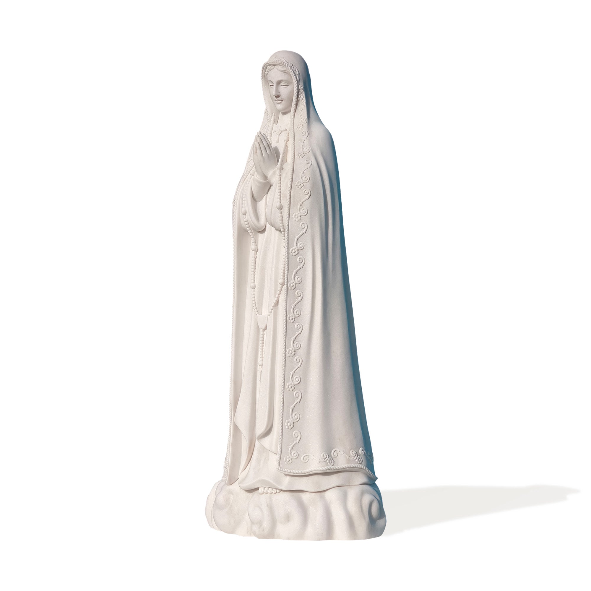 Hand-carved marble statue of Our Lady of Fatima in a serene praying pose, religious art sculpture designed for churches, chapels, and sacred garden installations.