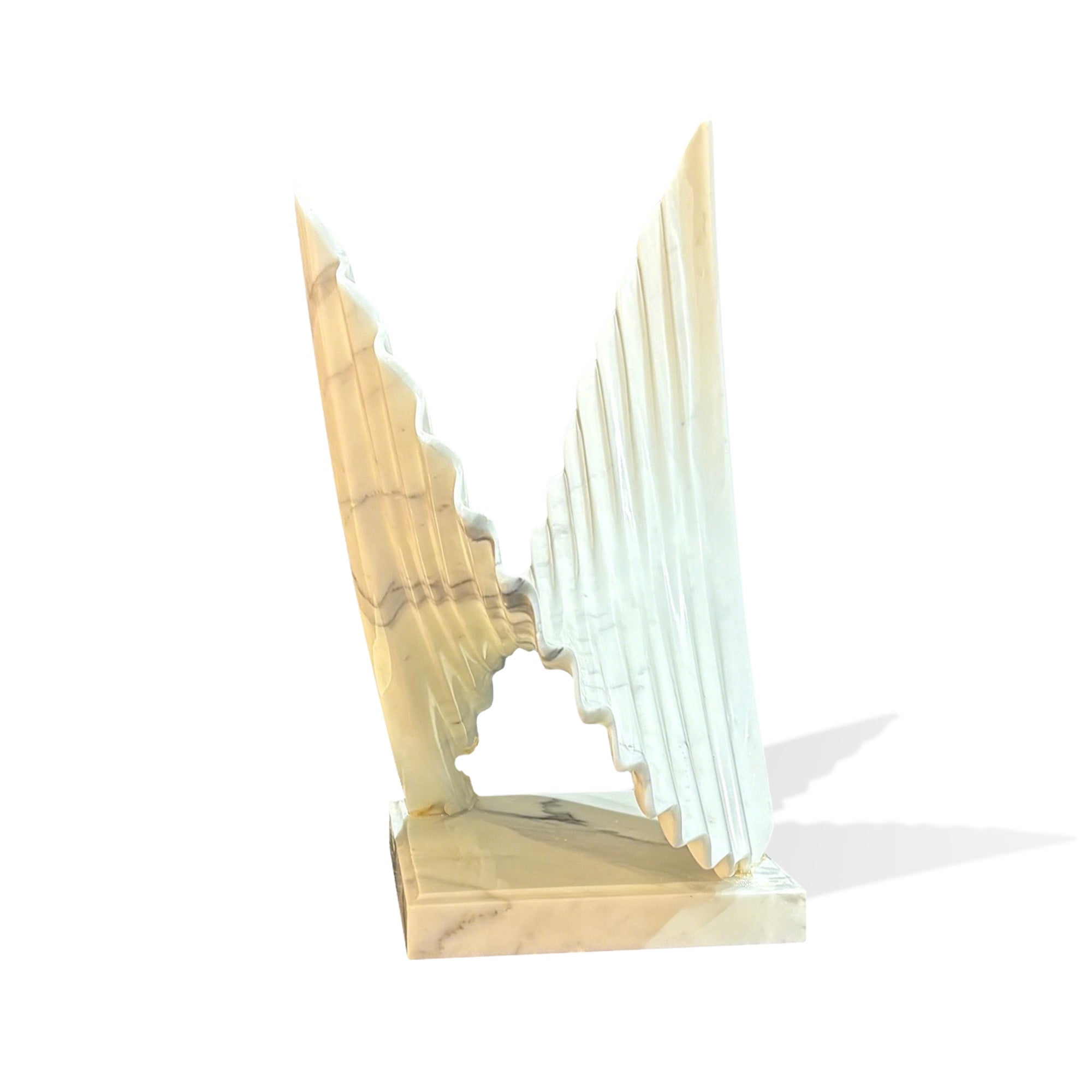 Modern Carrara marble abstract sculpture in side view with layered fan-like curves and sculptural stone form