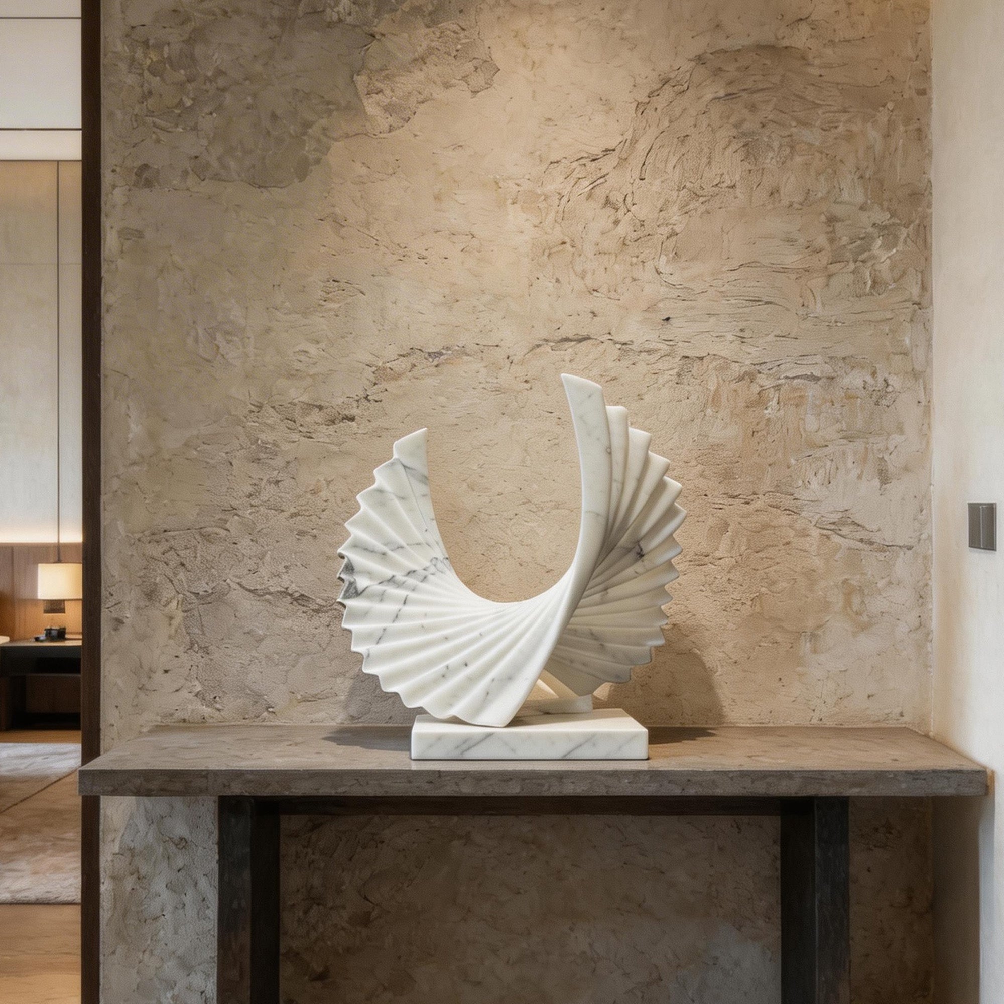 Modern Carrara marble abstract sculpture styled on a console table, elegant white stone decor for contemporary interiors