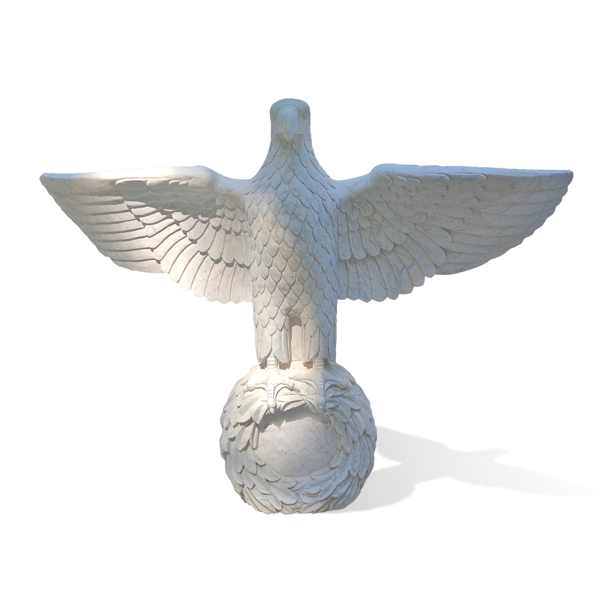 Front view of a hand-carved white marble eagle statue with spread wings standing on a decorative globe base