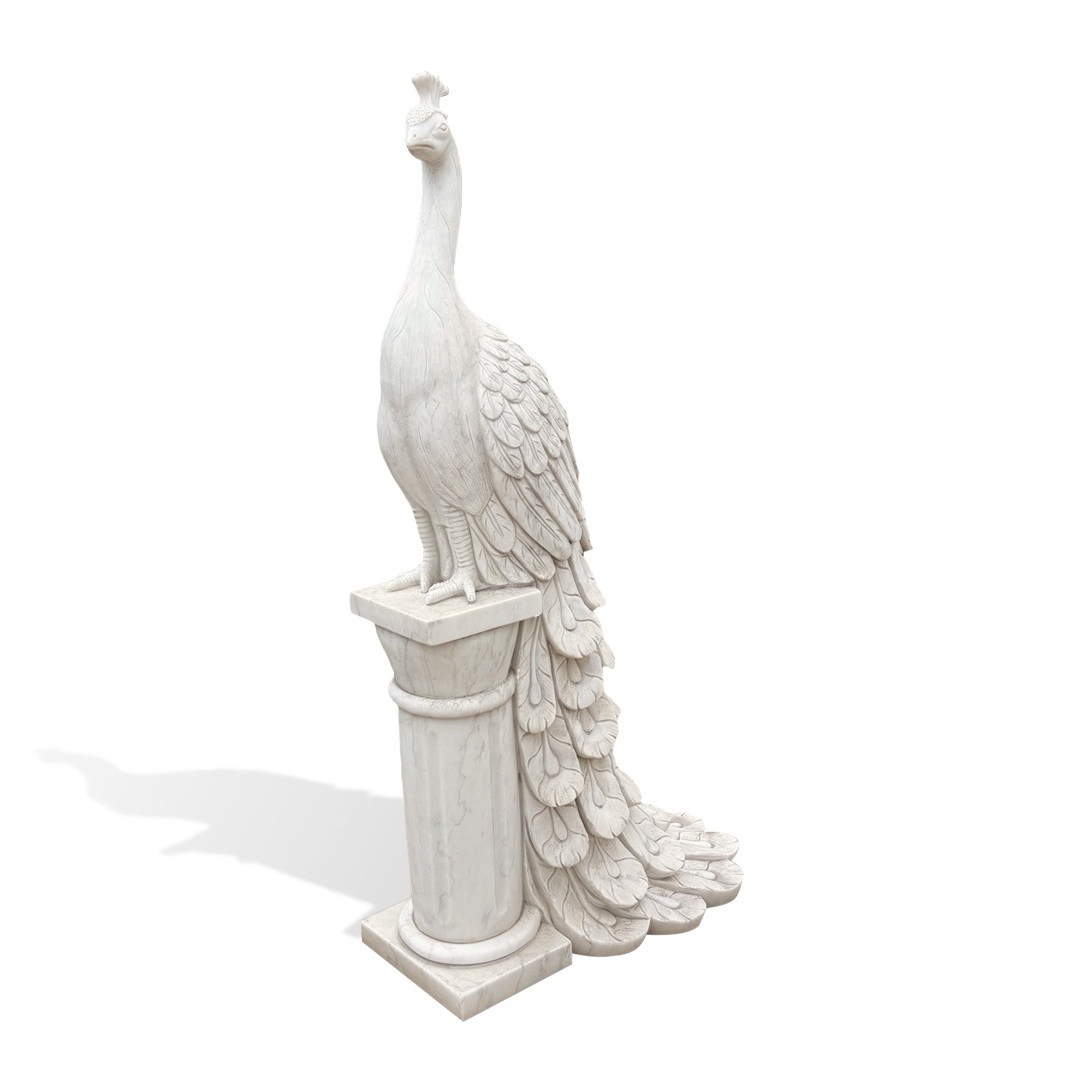 Angle view of an elegant hand-carved white marble peacock garden sculpture with a long tail on a column pedestal