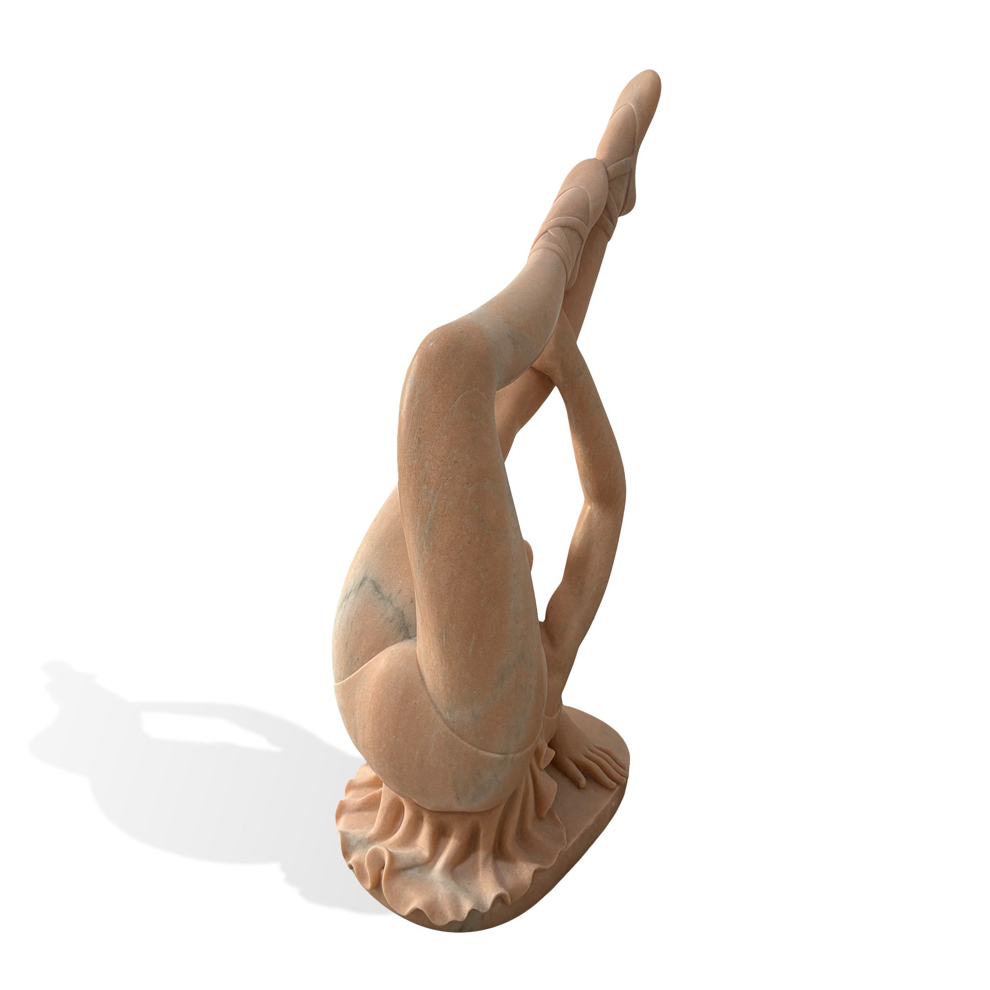 Side view of a contemporary marble dancer statue in an acrobatic extended-leg pose, showing the curved silhouette and natural stone veining