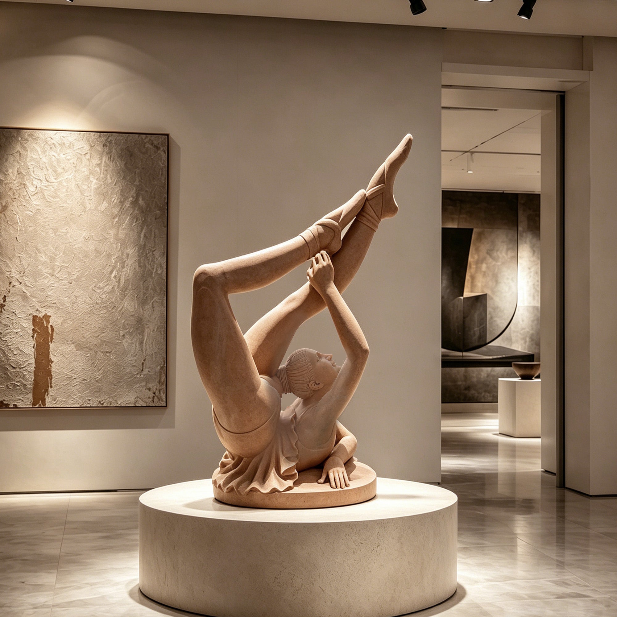 Natural red marble acrobatic dancer sculpture displayed on a round pedestal in a contemporary gallery, featuring an extended-leg pose and refined female figure design