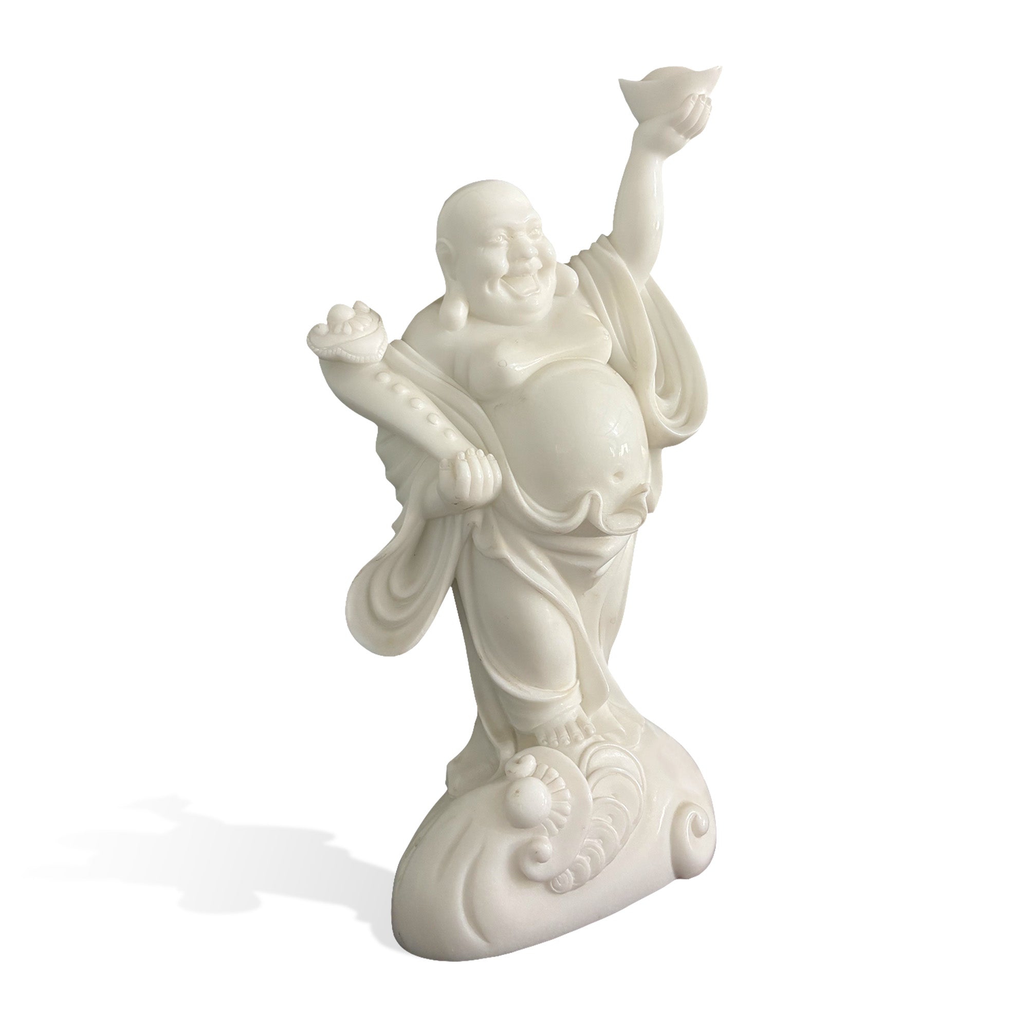Side view of a natural white marble Laughing Buddha statue with raised ingot, flowing robe, and decorative wave-shaped pedestal