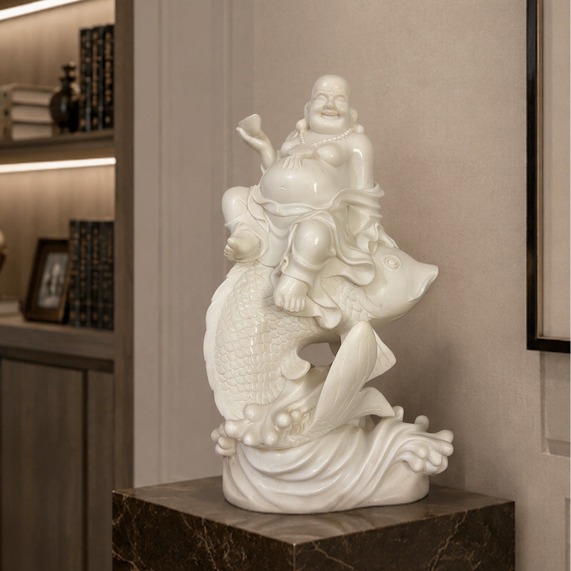 Hand-carved white marble koi fish Buddha statue styled in a refined living room as an auspicious home decor sculpture