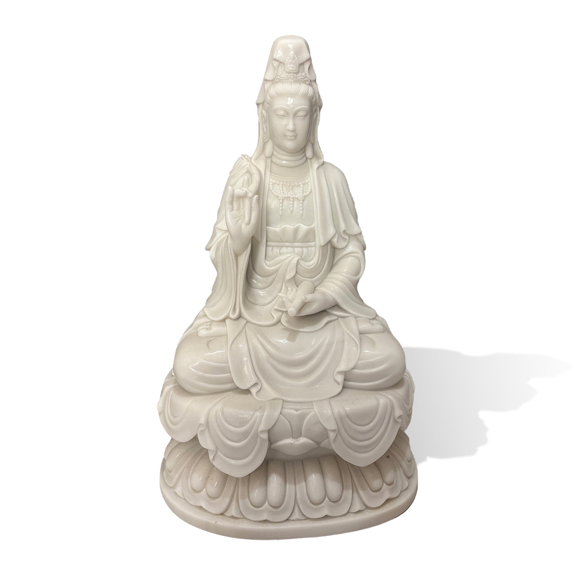 Front view of a natural white marble Guanyin Bodhisattva statue seated on a lotus pedestal with a serene expression and raised willow-inspired branch