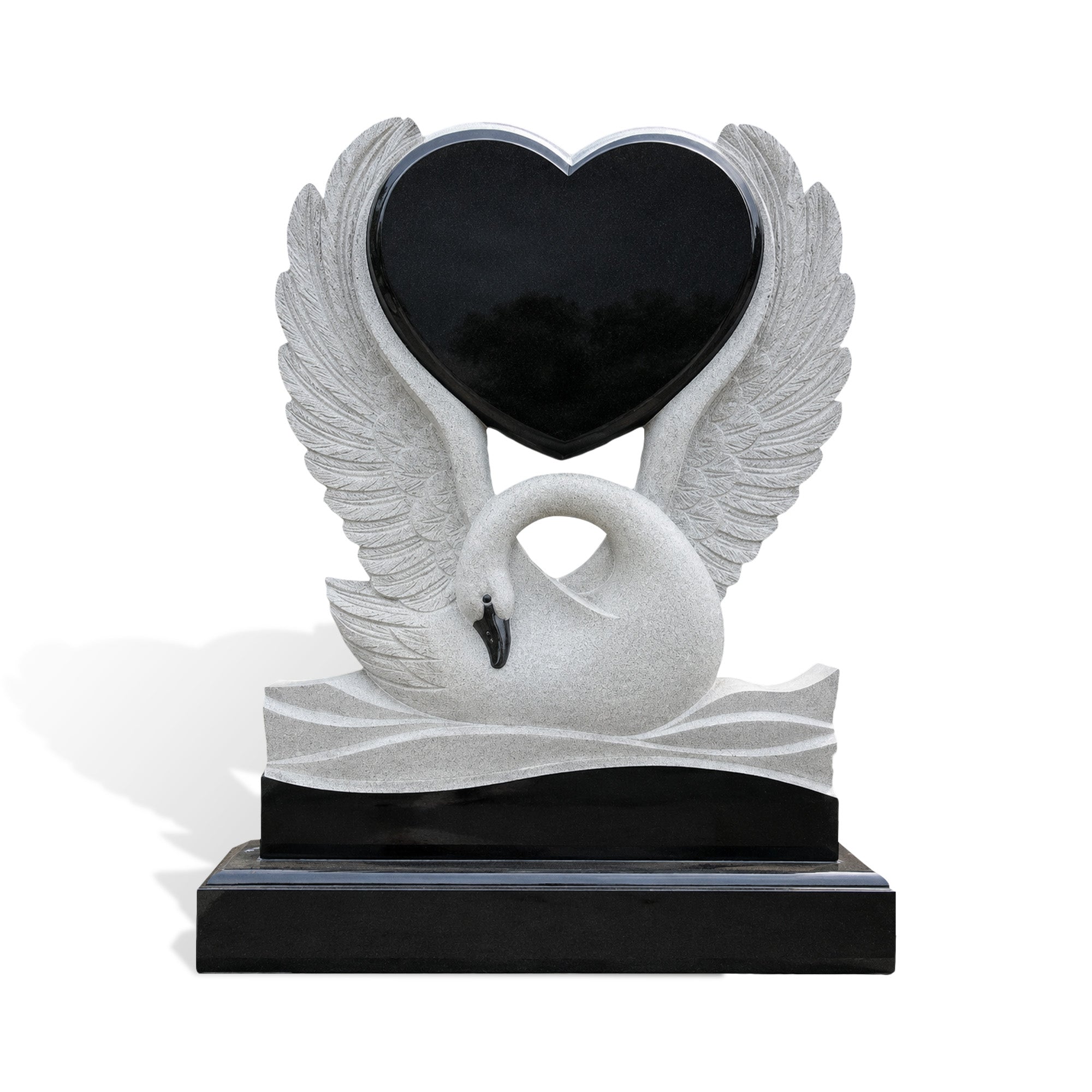 Front view of a sesame white granite swan heart headstone with black granite heart panel, carved feather wing, and polished black base