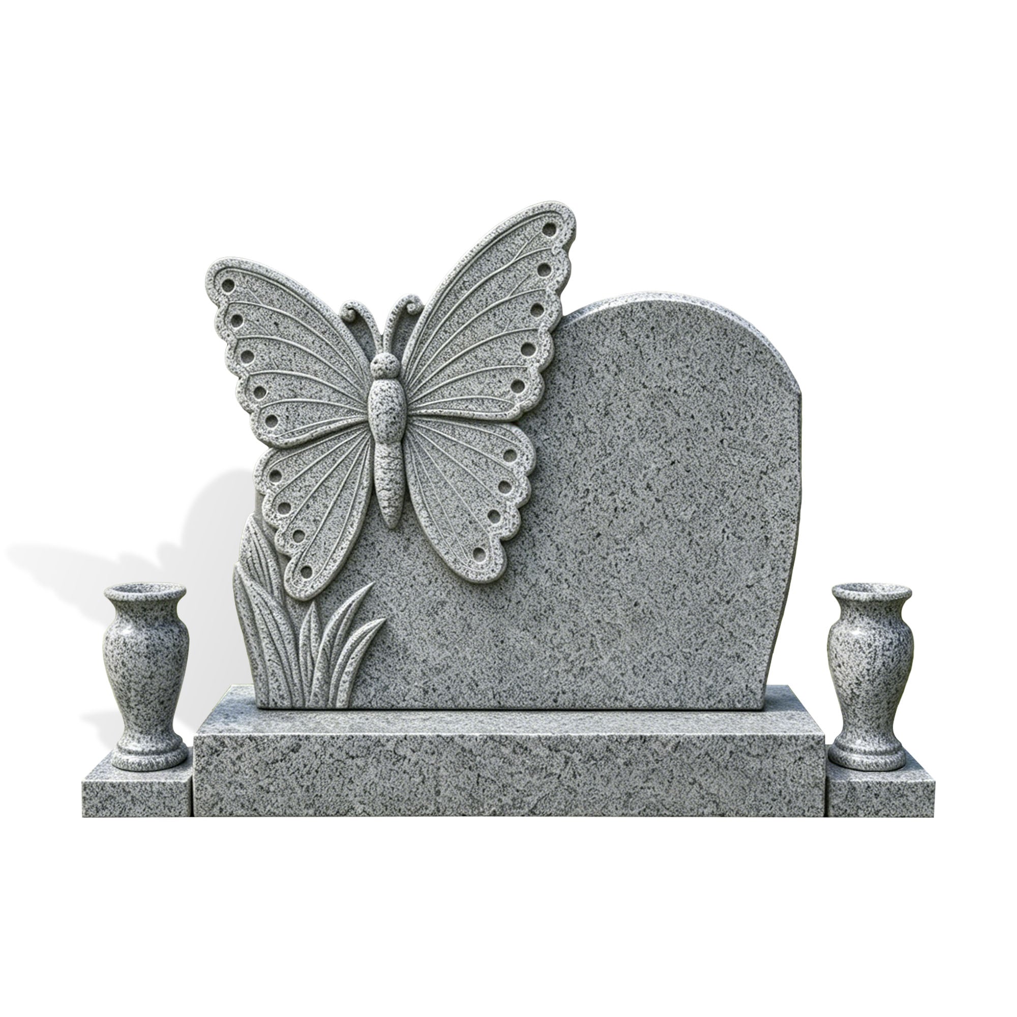 Natural gray granite butterfly headstone with side-mounted butterfly carving, rounded inscription tablet, grass detail, and matching flower vases.