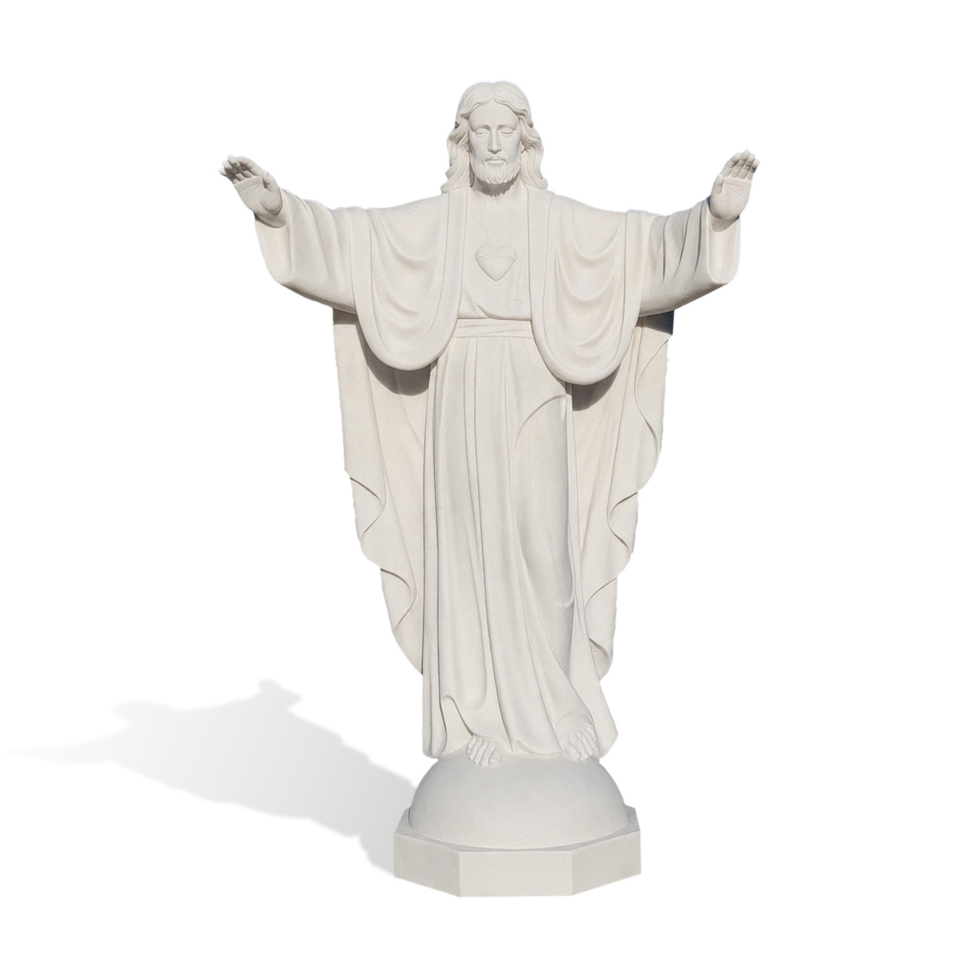 Front view of a hand-carved white marble Sacred Heart of Jesus statue with open arms, flowing robe, Sacred Heart emblem, and pedestal base