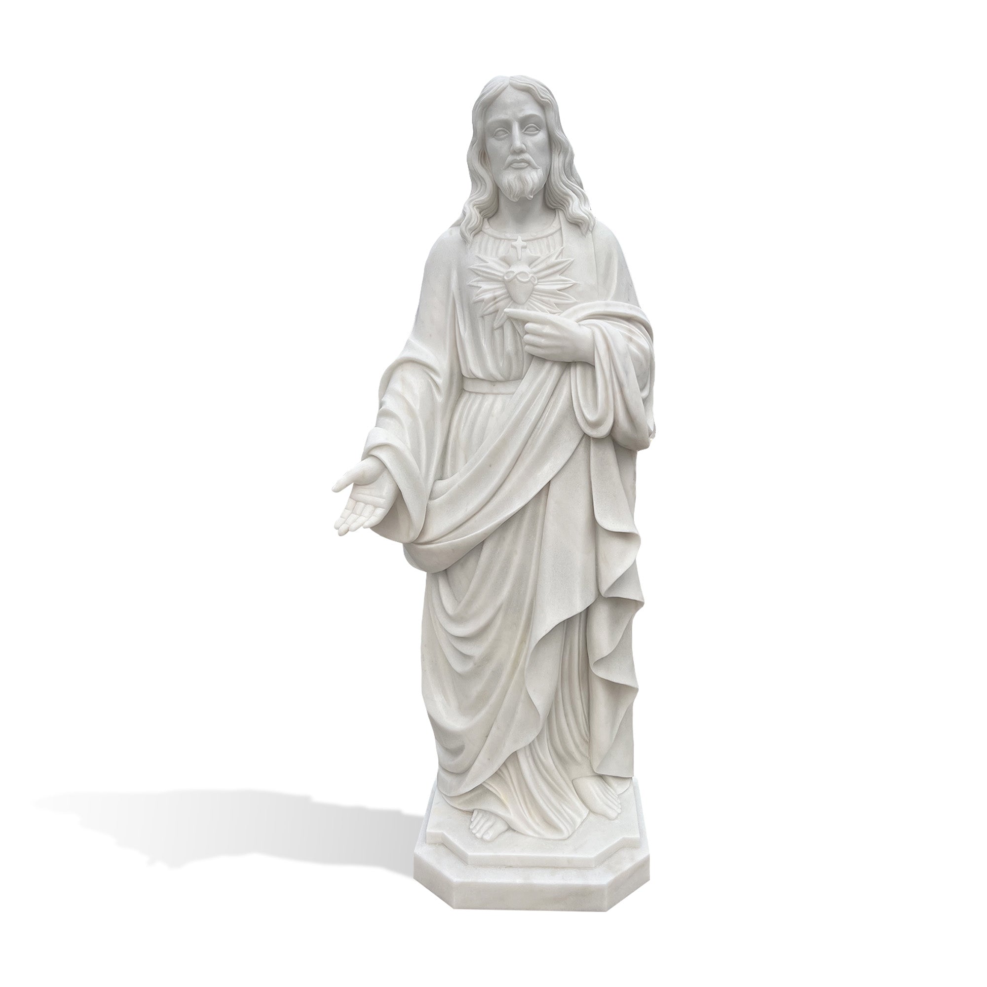 Hand carved white marble Sacred Heart Jesus welcoming statue with an open hand gesture symbolizing compassion, invitation, and everlasting love.