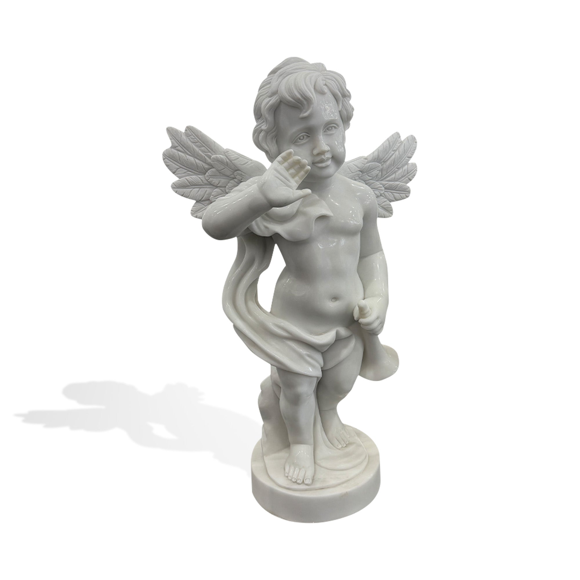 White marble cherub statue holding a trumpet, featuring winged angel figure, raised hand gesture, carved hair, feathered wings, draped cloth, and round base on white background