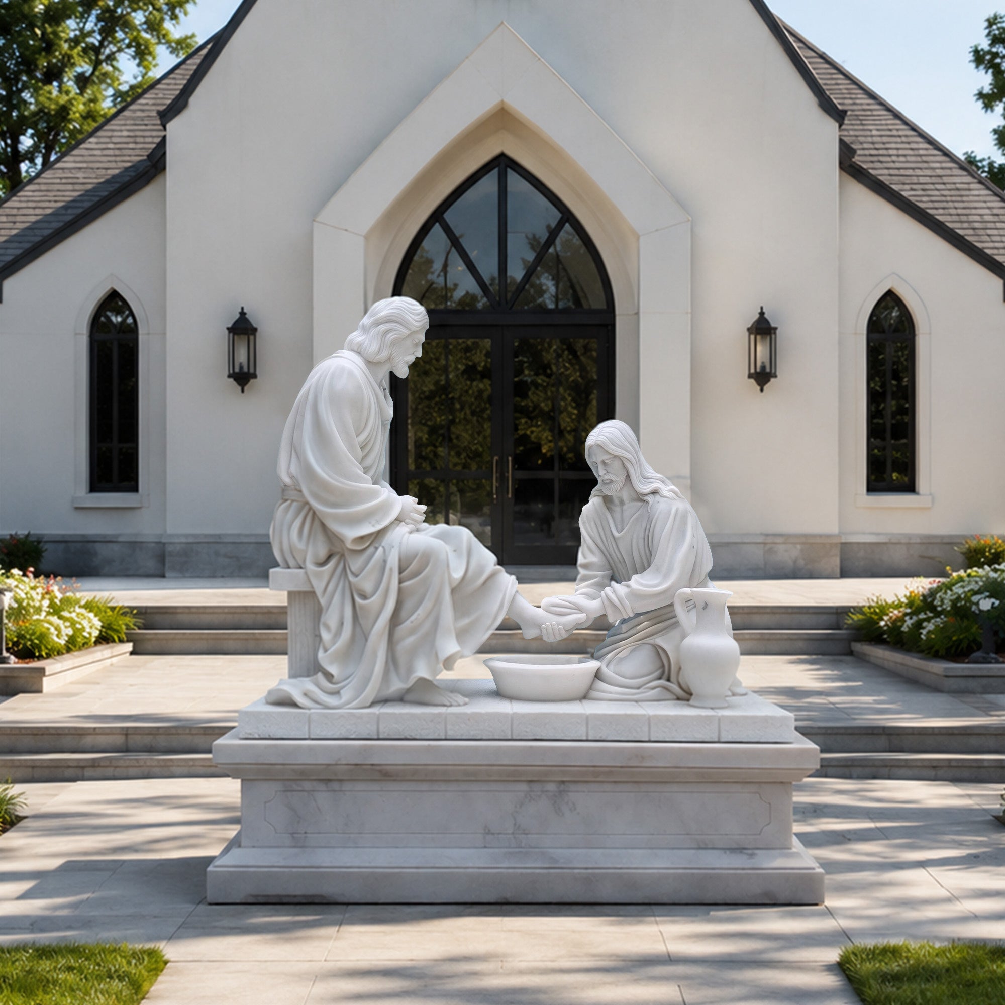 Jesus washing the disciple’s feet marble statue installed in front of a church, designed as a Christian religious sculpture for chapel courtyards and prayer gardens