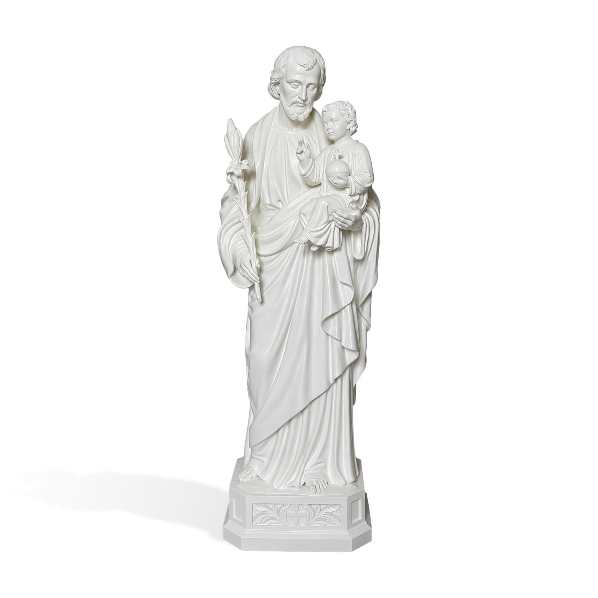 Front view of a white marble Saint Joseph and Child Jesus statue, depicting Saint Joseph holding a lily staff and the Christ Child with an orb, detailed flowing robes, serene facial expressions, and a carved pedestal.