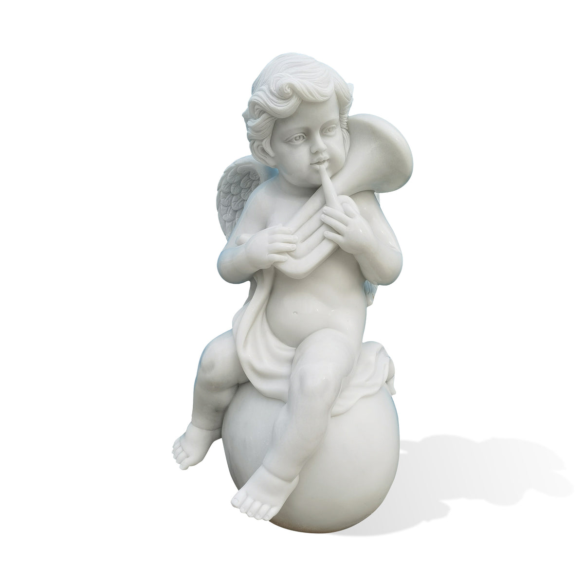 Hand-carved white marble cherub statue seated on a sphere, playing a curved horn with detailed curls, feathered wings and flowing drapery.