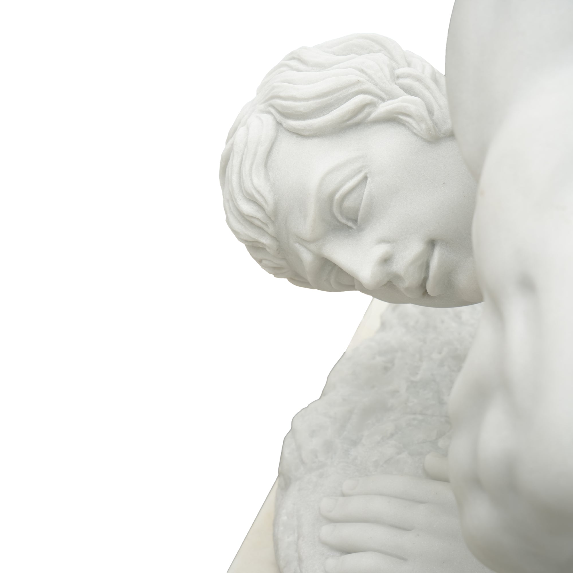 Close-up of The Wrestlers marble statue replica showing the fallen athlete’s face and hand details, emphasizing classical realism and fine carving