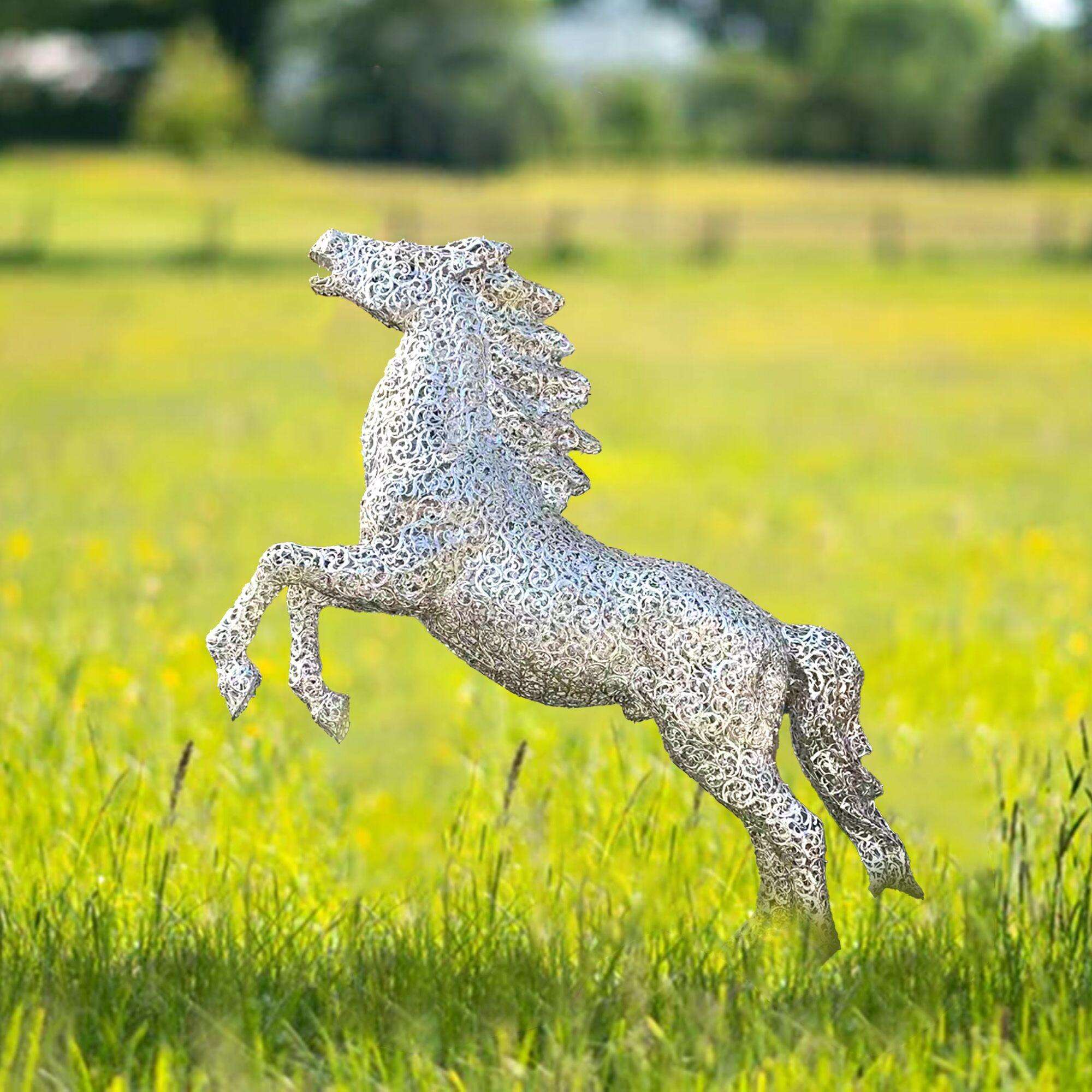 garden animal sculpture jumping horse on grass