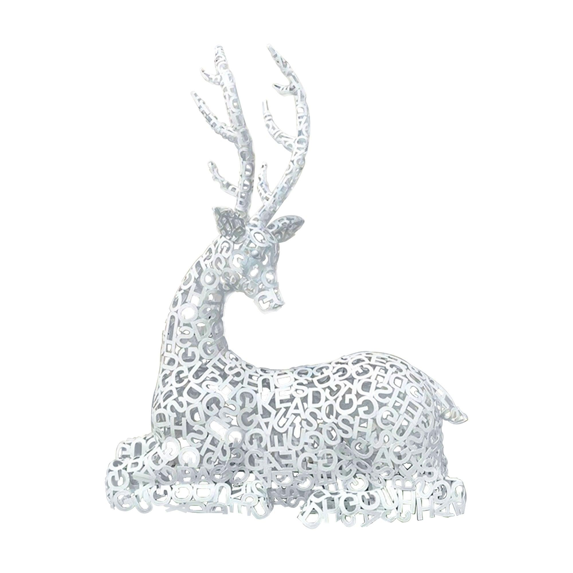 white letter metal sitting elk sculpture