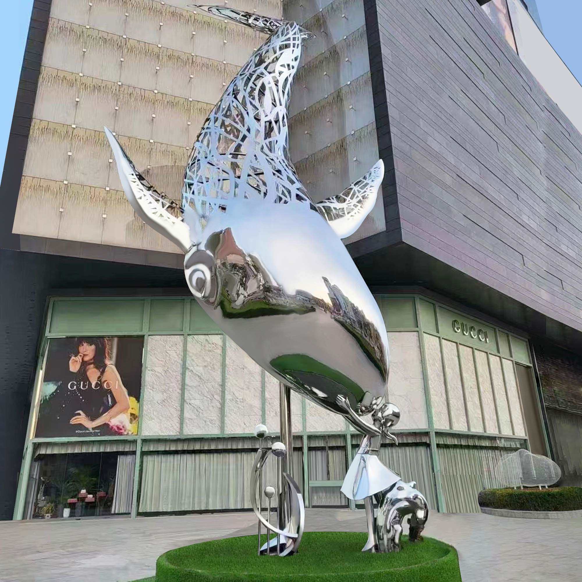 mid-scale night light metal sculptures dolphin kiss kid in shopping mall plaza