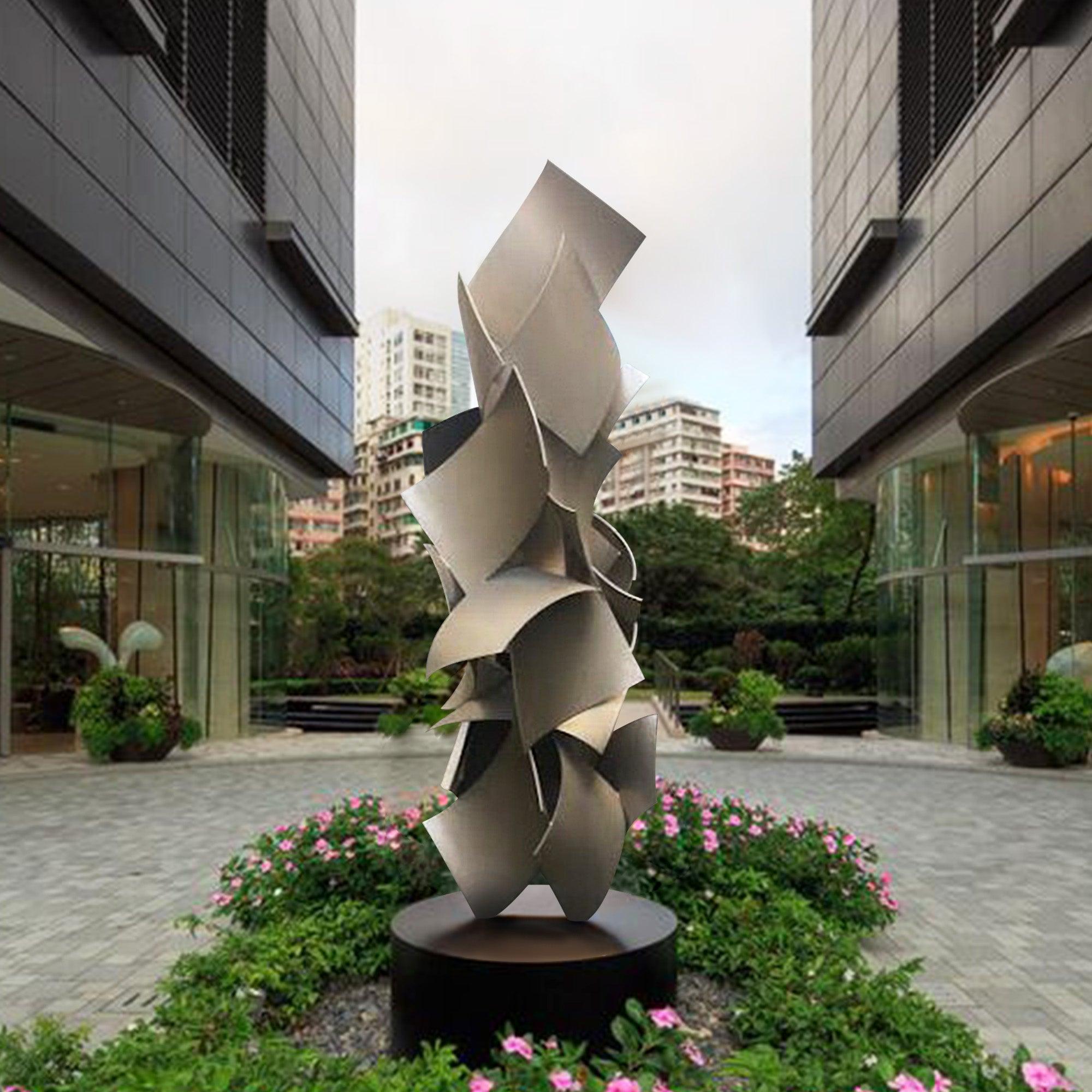 abstract stainless steel sculpture display between to building for outdoor lanscape