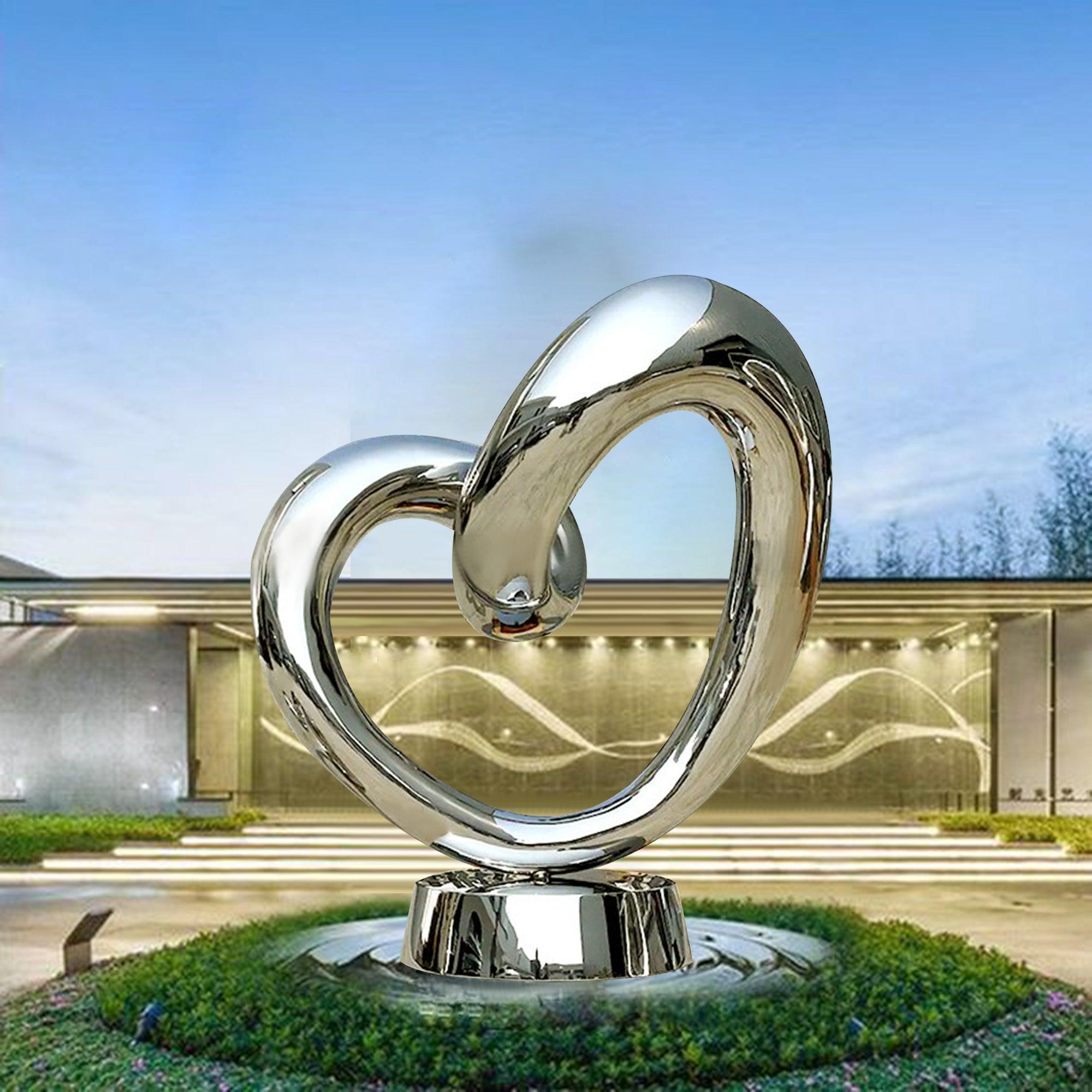 hollow circle metal mirror polish heart sculpture artwork in outdoor