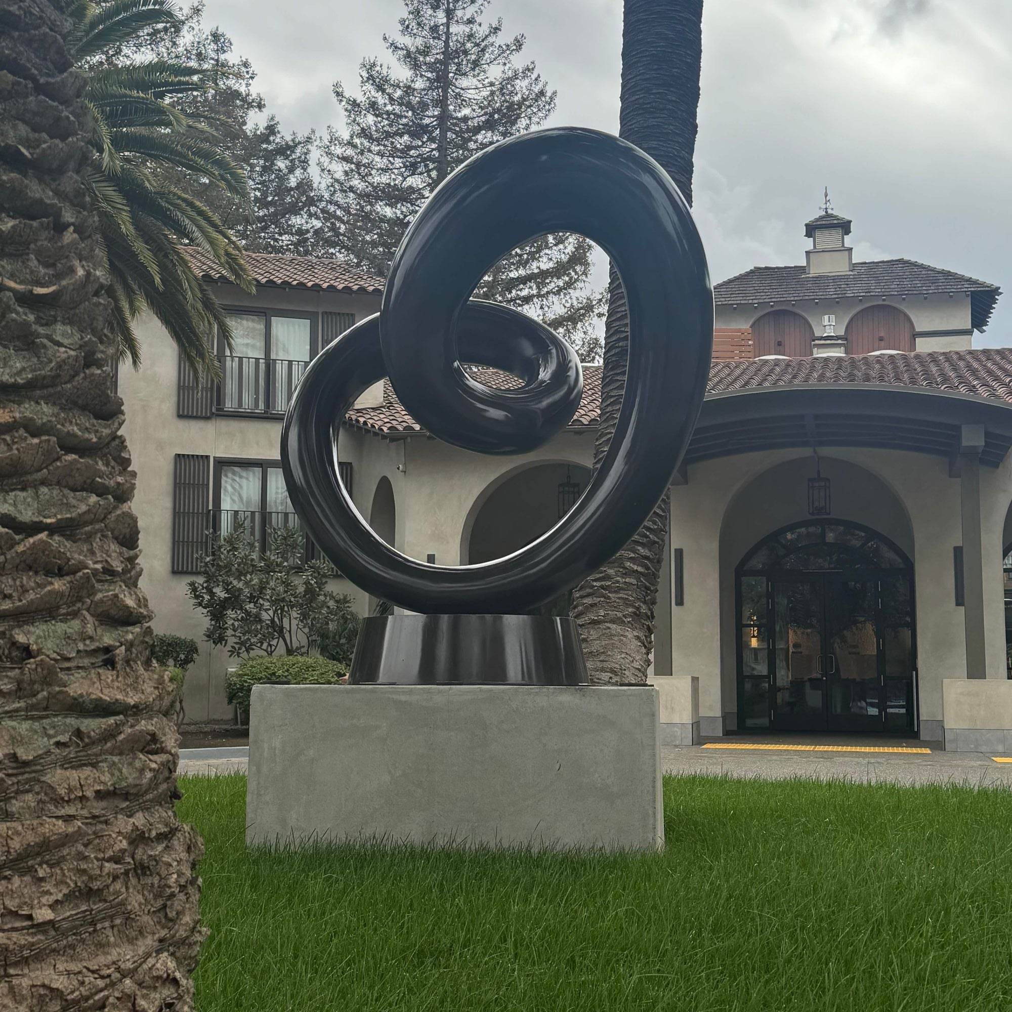 glossy stainless steel heart sculpture at embassy suites hilton napa valley main entrance outdoor landmark