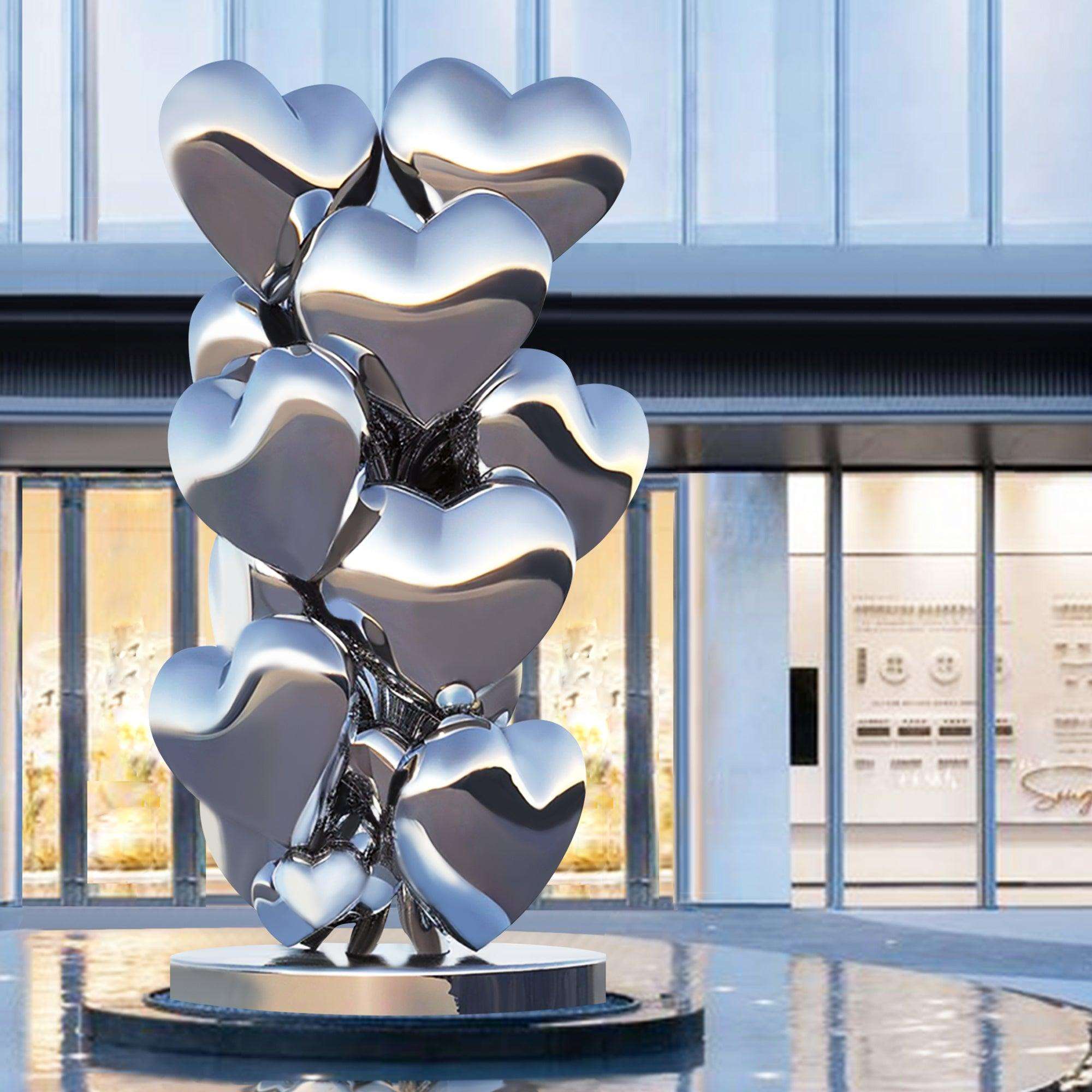 modern outdoor sculpture silver color stacked heart sculpture for outdoor landscape