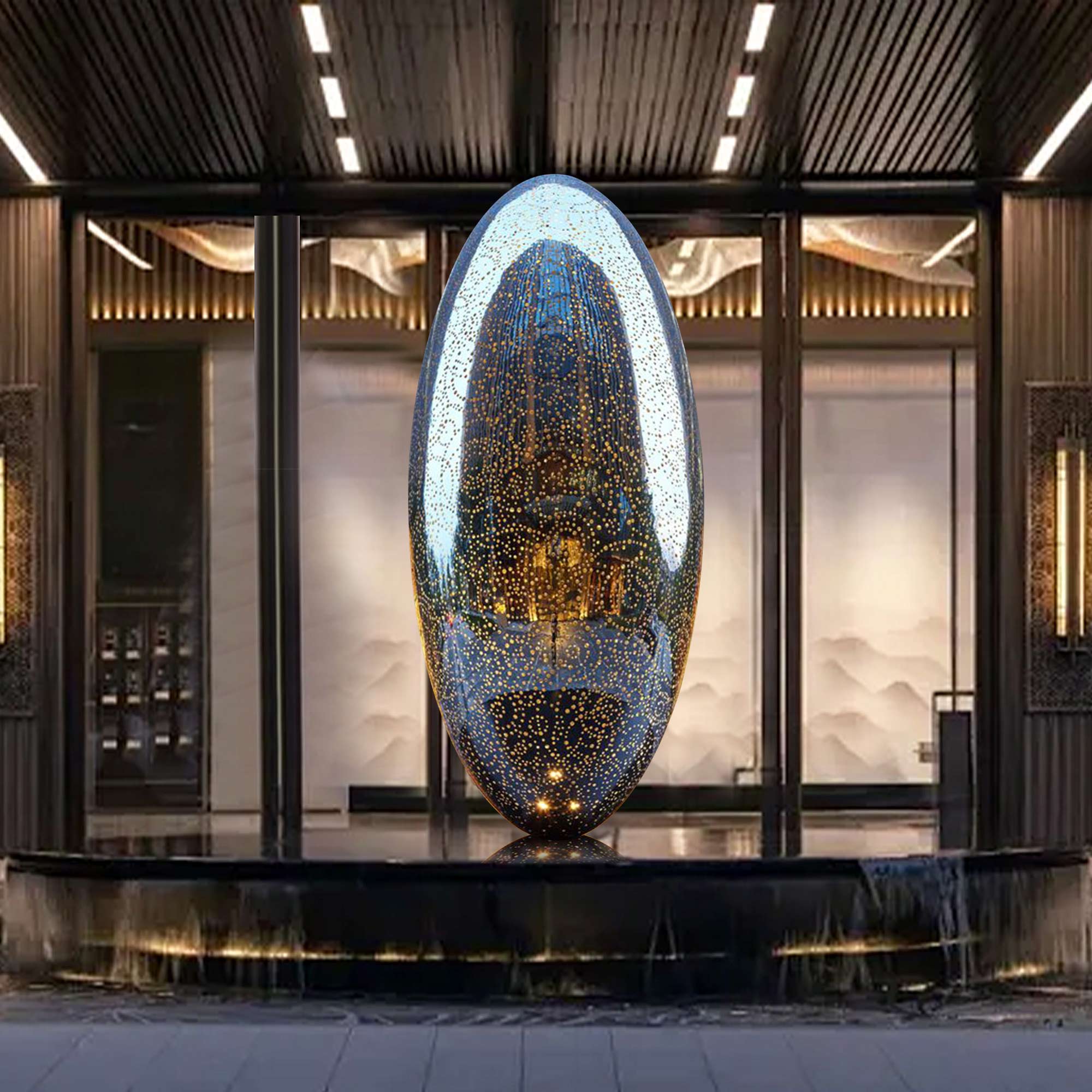 Illuminated oval stainless steel sculpture with a polished mirror finish and intricate laser-cut patterns, glowing with integrated LED lights in an outdoor setting