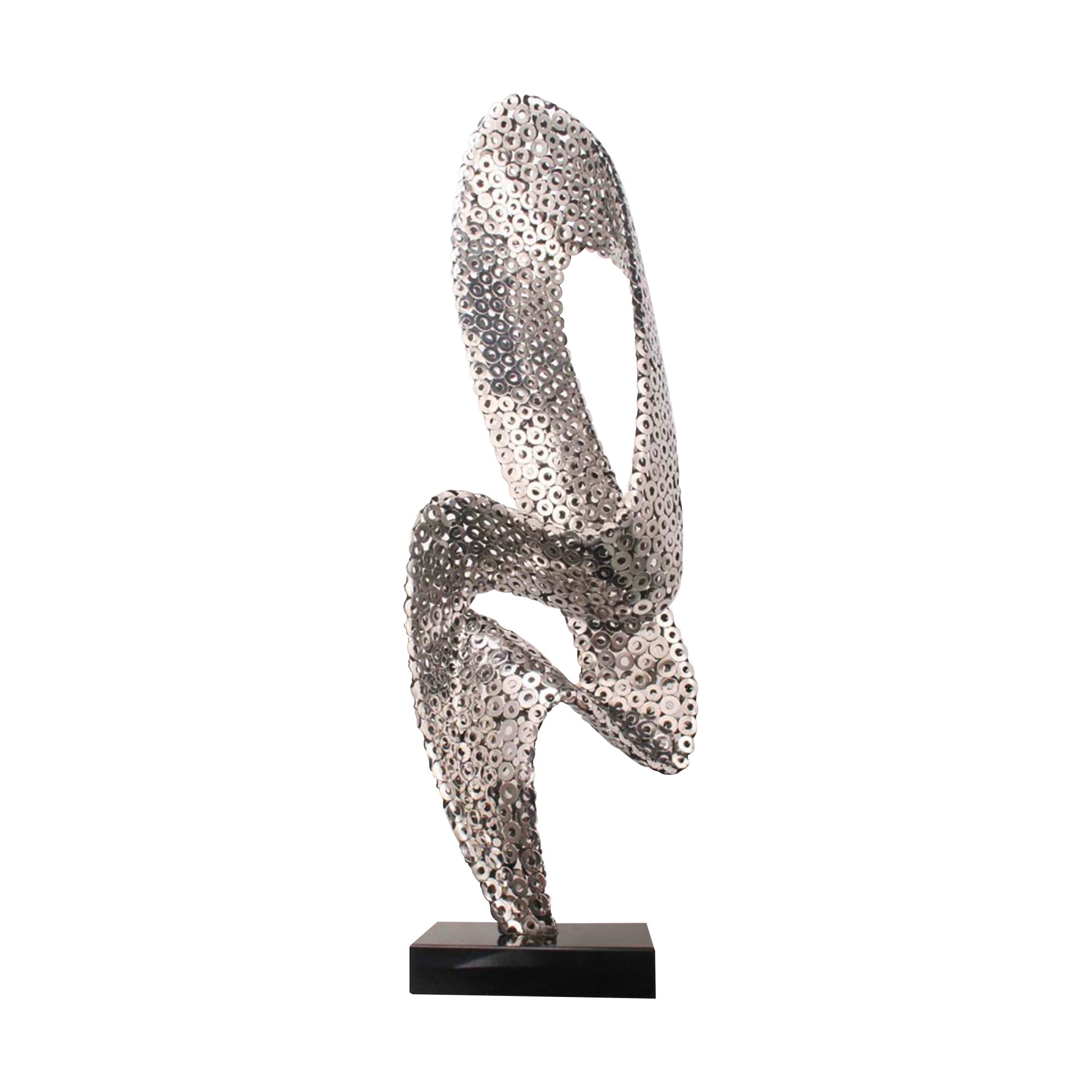 Modern abstract silver sculpture with a perforated metallic design