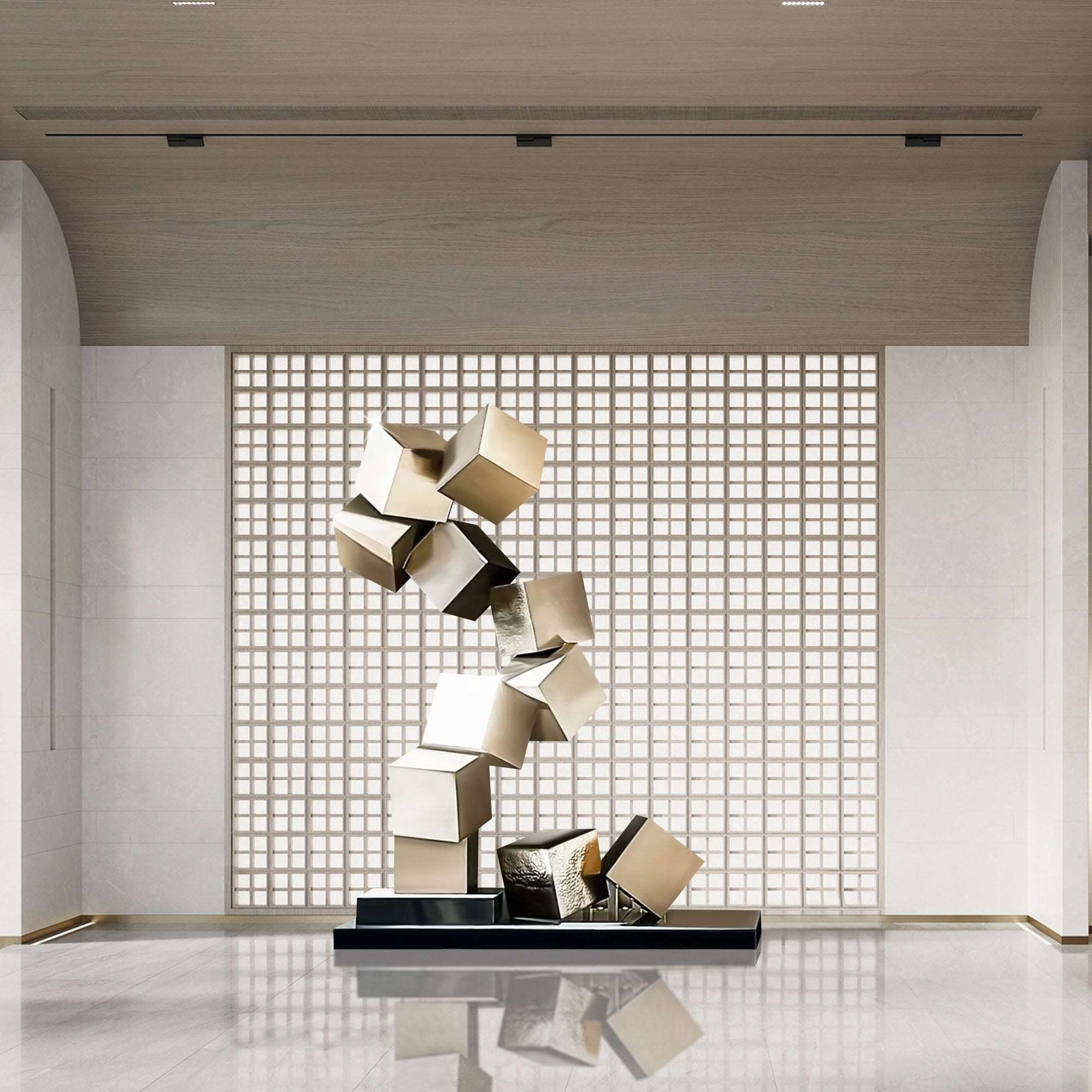 Abstract sculpture featuring stacked gold cubes, displayed in a modern interior setting.