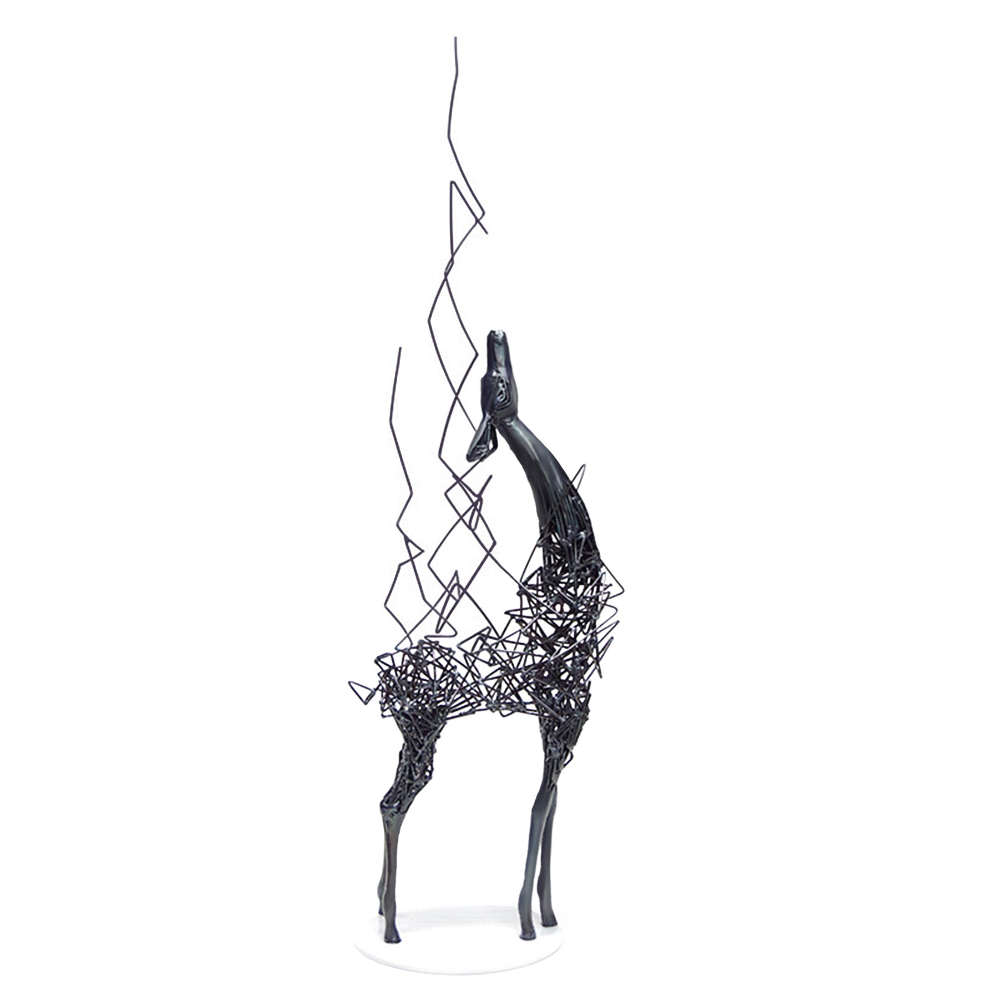 Abstract metal floor sculpture of a deer with fragmented design in glossy black and matte white