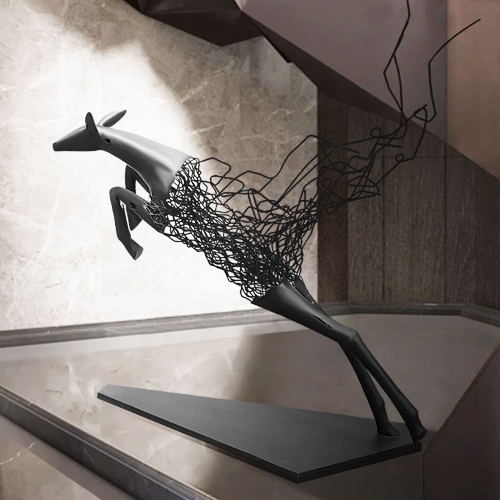 Abstract metal floor sculpture of a deer with fragmented design in glossy black and matte white dislpay indoor lobby