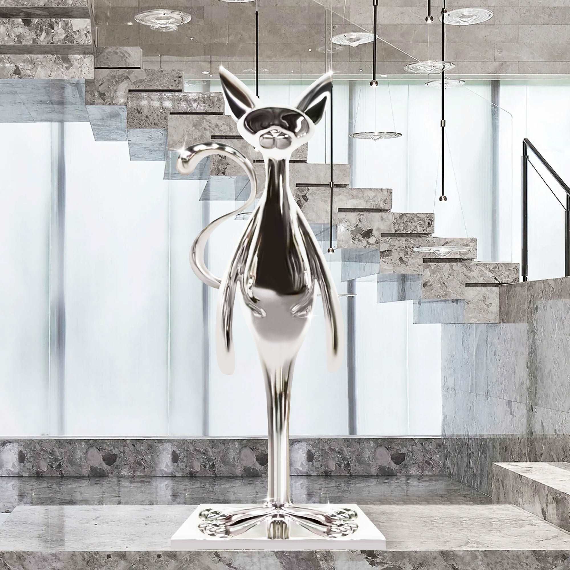  Abstract stainless steel cat sculpture with polished chrome finish, displayed in a modern indoor setting.