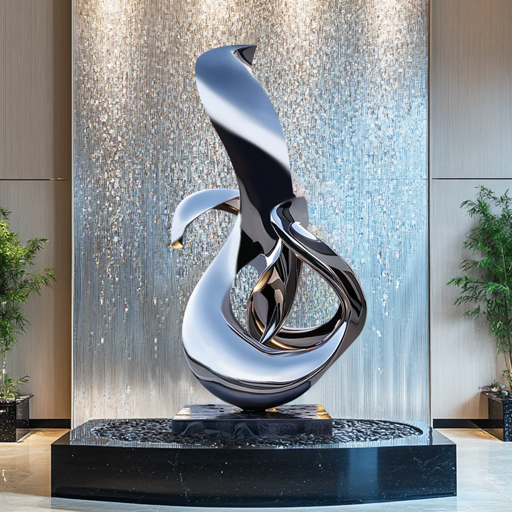 outdoor modern abstract stainless steel sculpture in hotel lobby