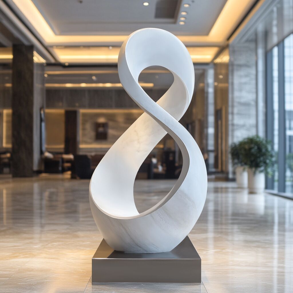 Custom stainless steel abstract sculpture with a white body and natural stainless steel base,dislpay in the hotel lobby