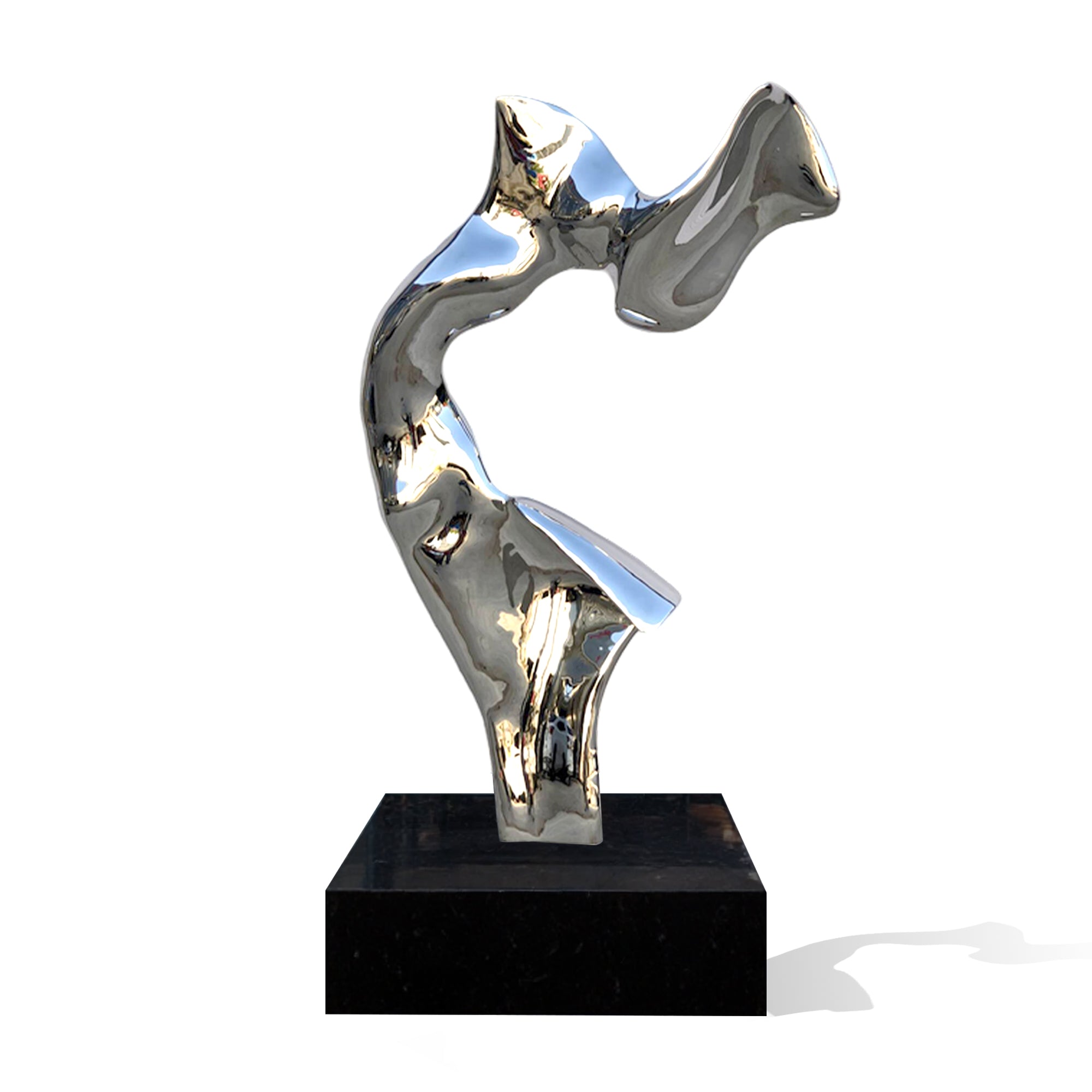Metallic abstract sculpture on a black base against a white background