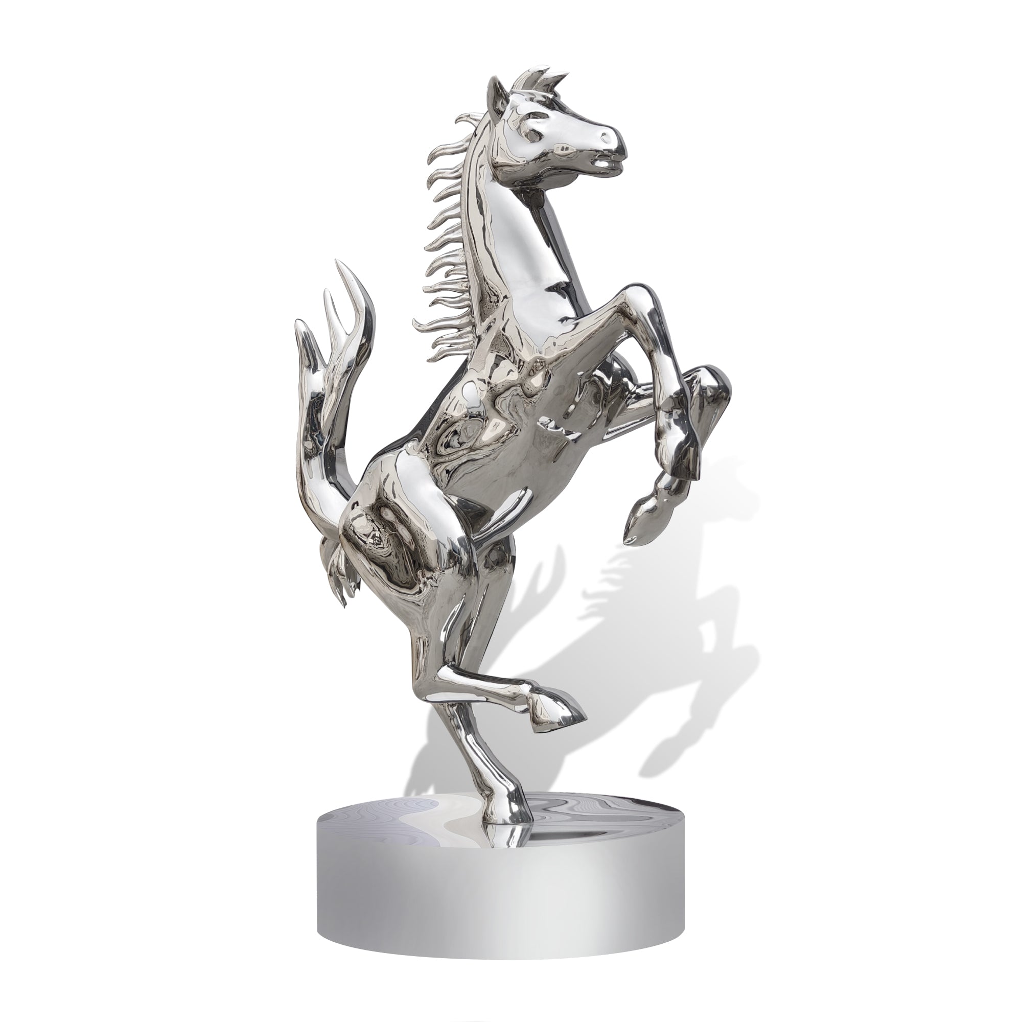 Silver metal horse sculpture on a white background