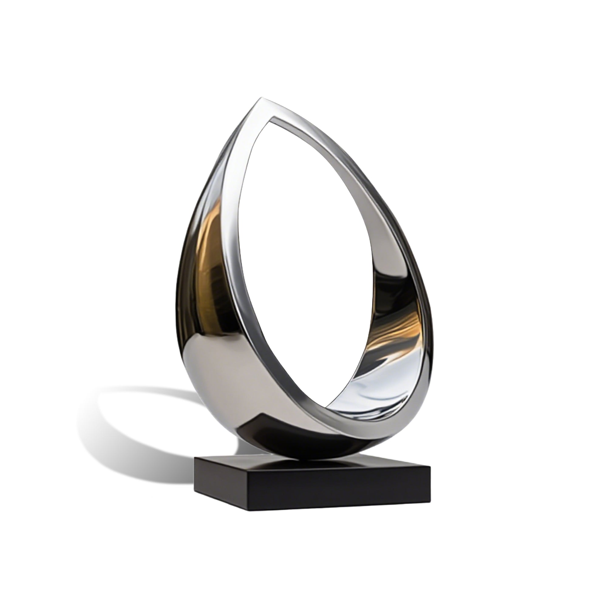 Silver teardrop-shaped sculpture on a black base against a white background