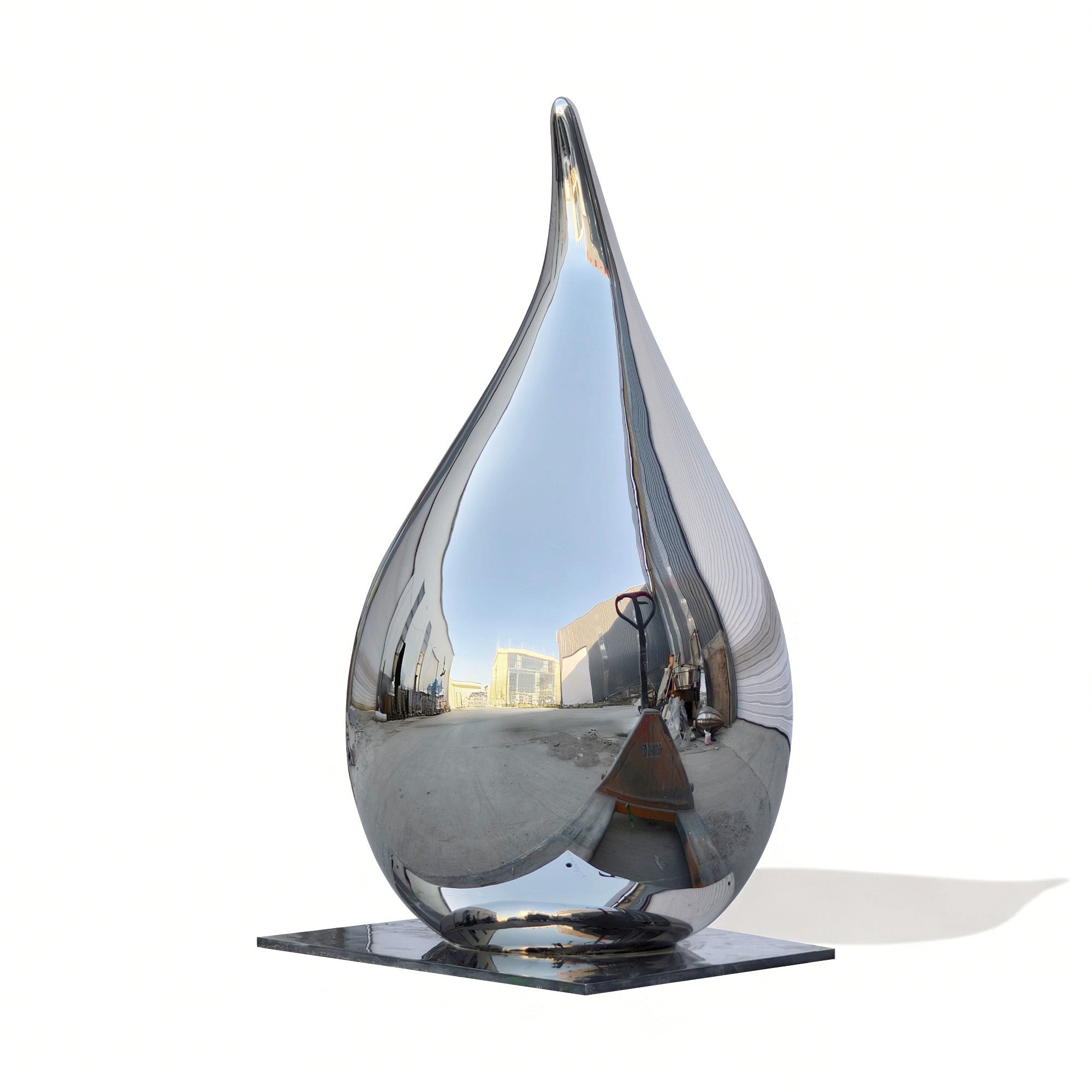 A contemporary outdoor drop sculpture made of stainless steel, perfect for adding elegance and reflection to any garden or public space.