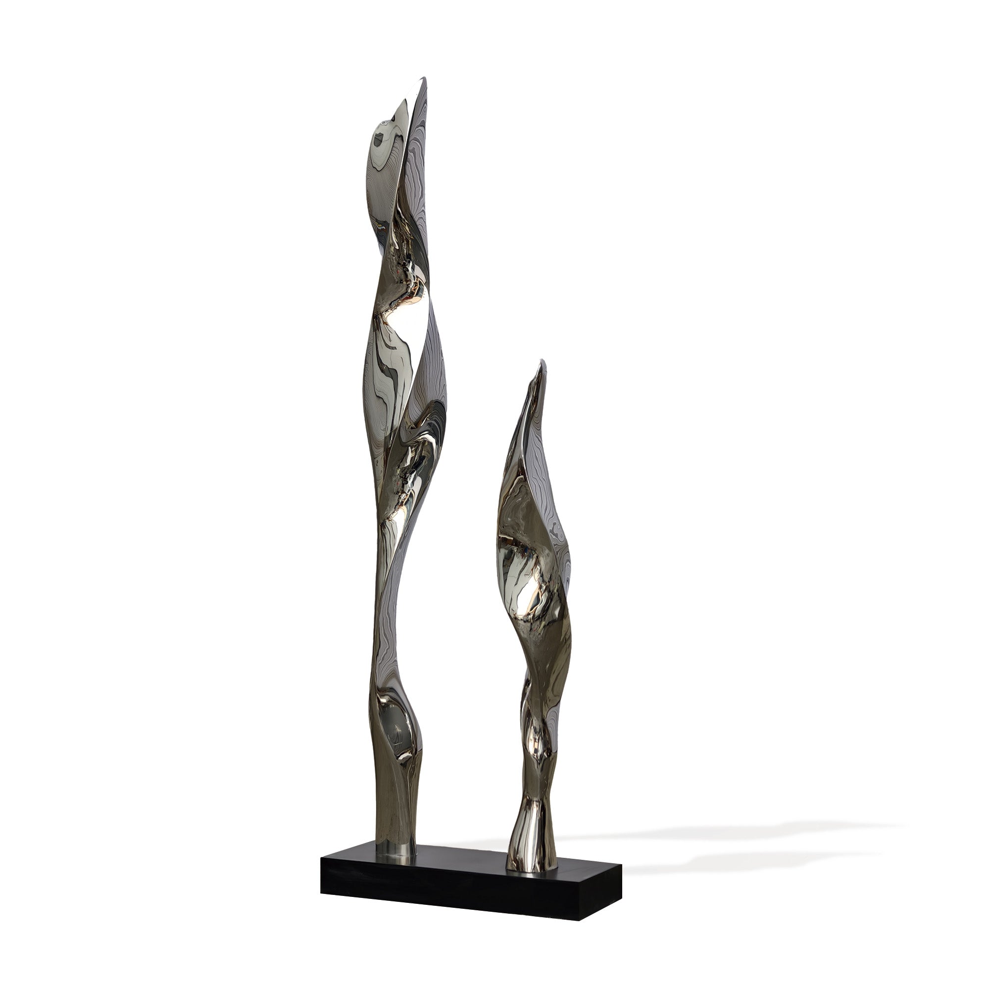 Contemporary mirror-finish sculpture on a sleek black base, capturing dynamic, flowing curves that evoke movement and elegance in modern interior settings.