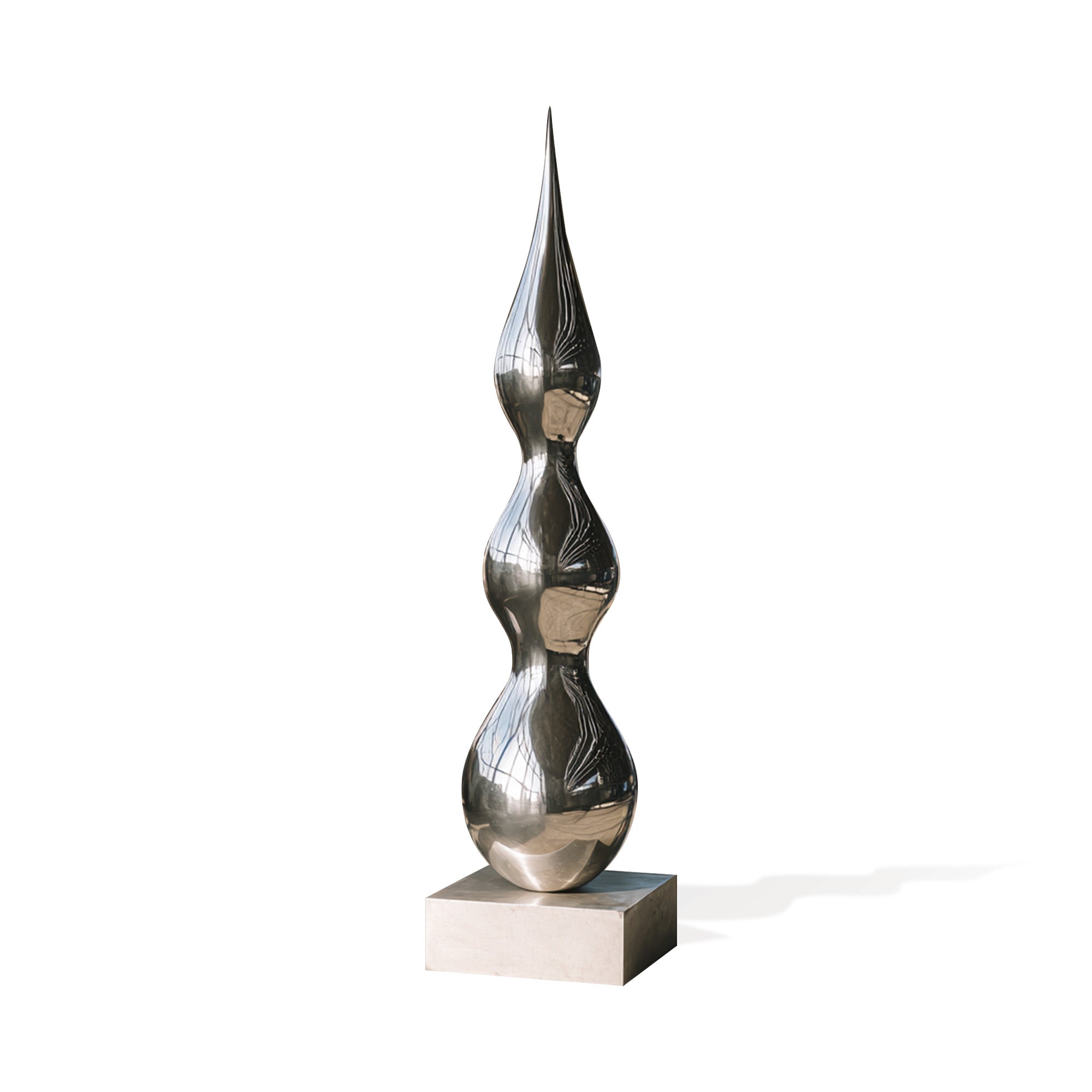 Abstract metallic sculpture on a white background